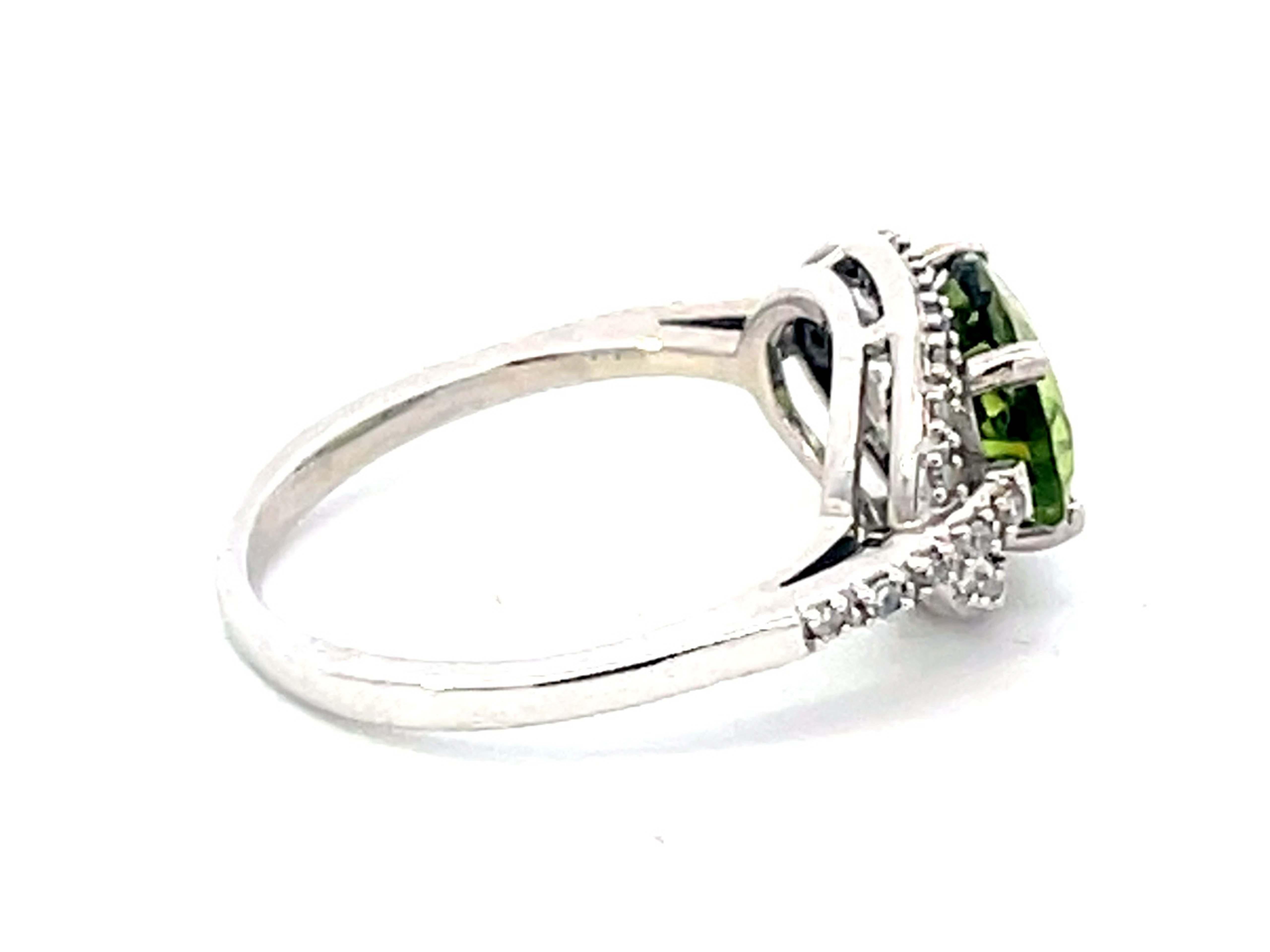 Oval Cut Oval Green Peridot and Diamond Halo Ring in 14k White Gold For Sale