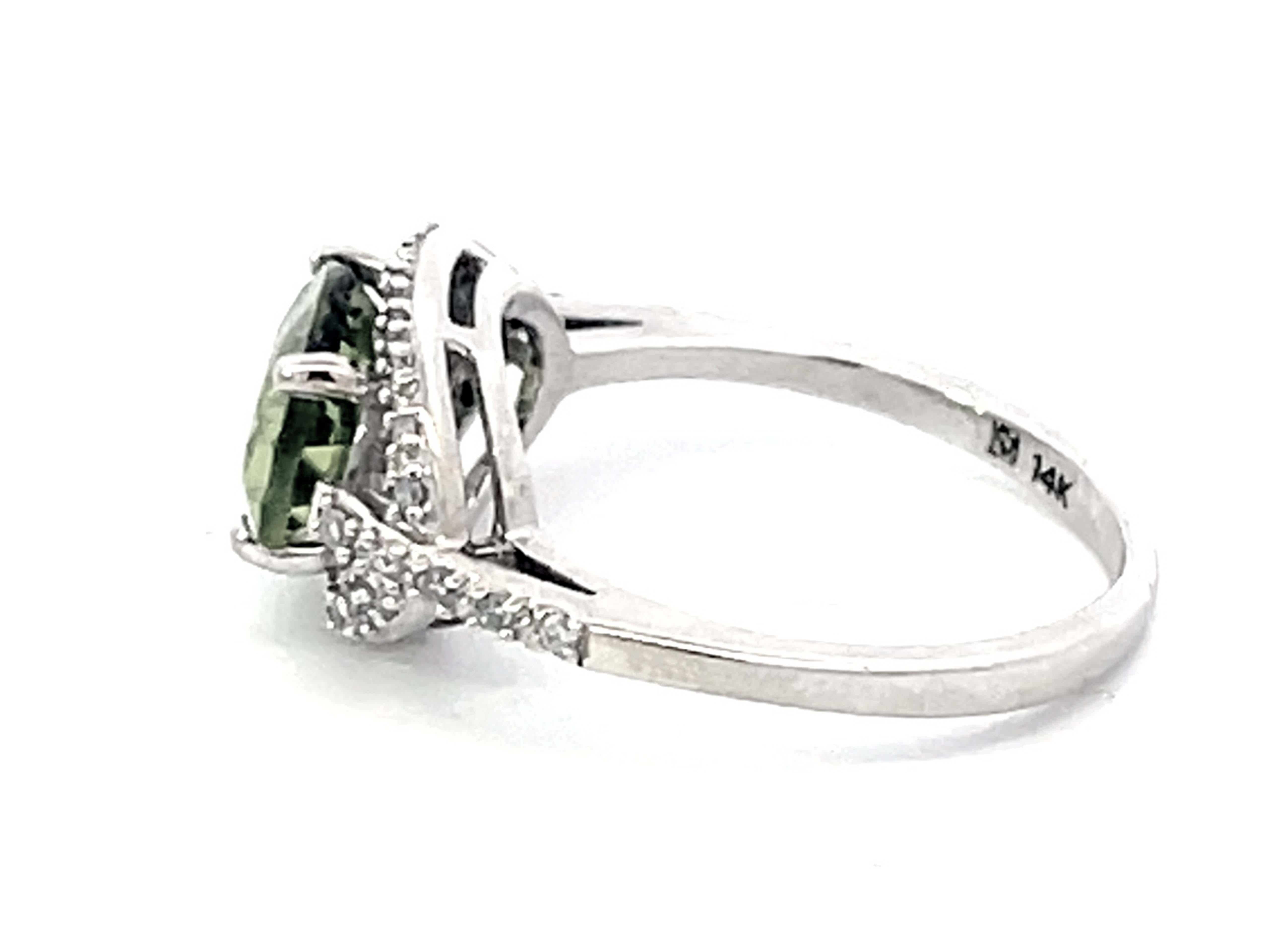 Oval Green Peridot and Diamond Halo Ring in 14k White Gold In Excellent Condition For Sale In Honolulu, HI