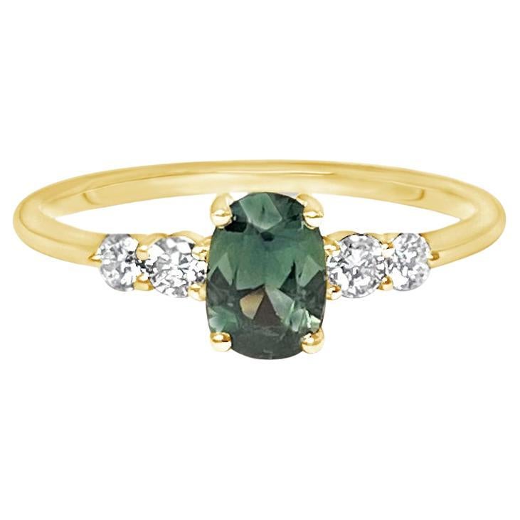 Oval green sapphire and diamonds engagement ring