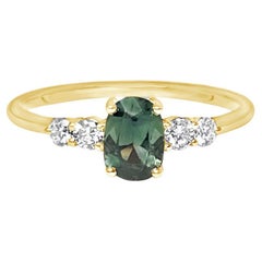 Ovaler grüner Saphir und Diamanten-Verlobungsring