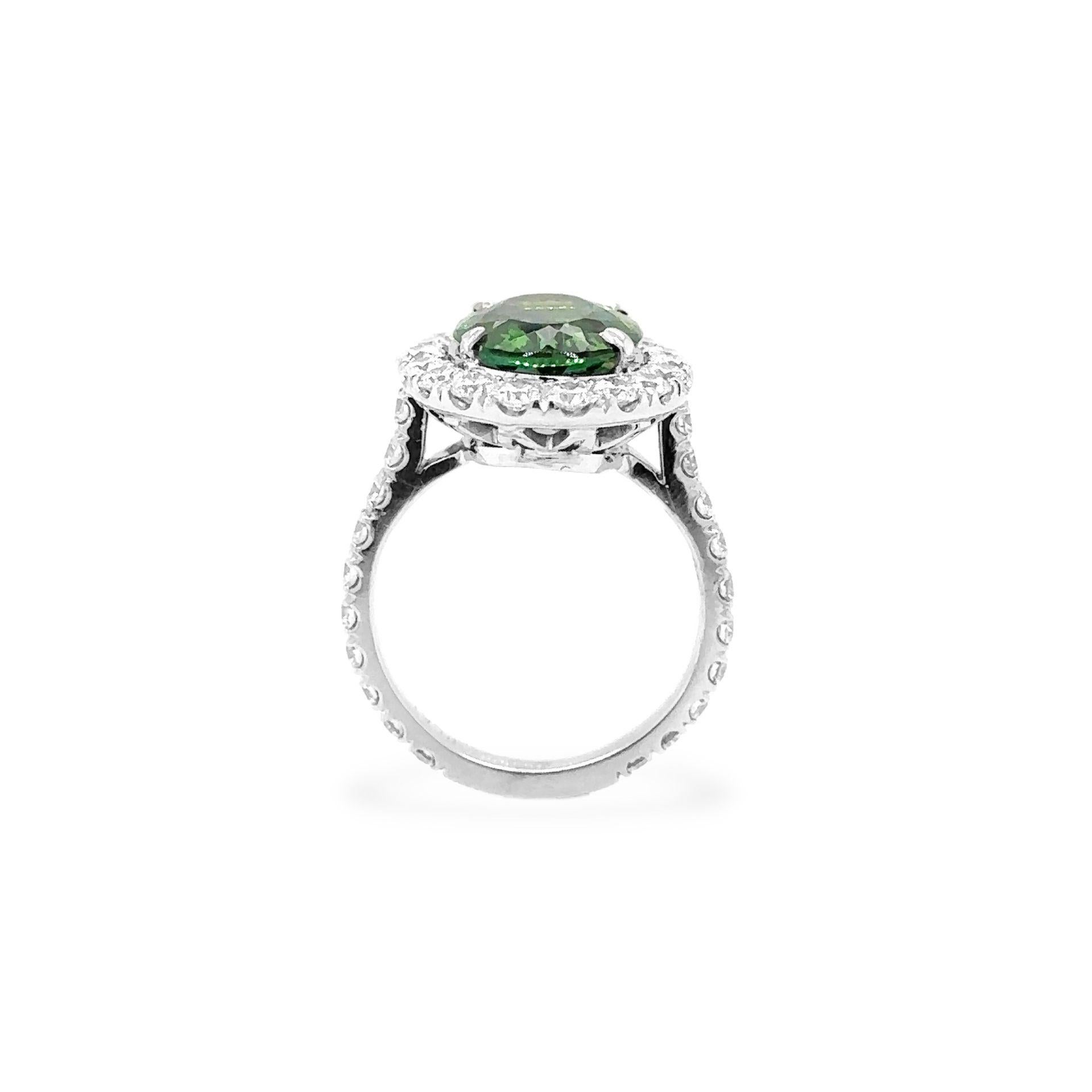 Oval Cut Oval Green Tourmaline and Diamond Ring 7.08 carats Platinum For Sale