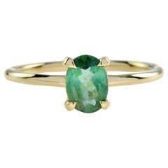 Oval Green Tourmaline Minimal Solitaire Ring in 9K Yellow Gold