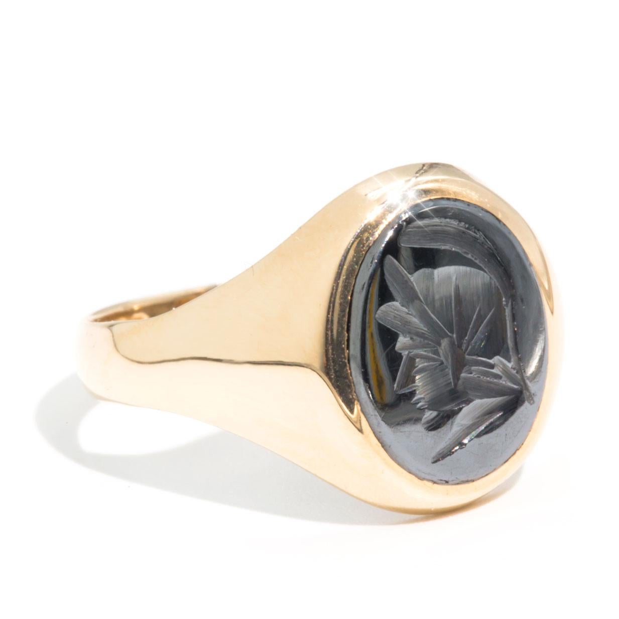 Forged in 9 carat yellow gold is this handsome vintage mens solitaire signet ring that features an intaglio Roman Head in Hematite. We have named this dapper vintage ring The Rani Ring. The Rani Ring has smooth, curved lines and flows to a domed