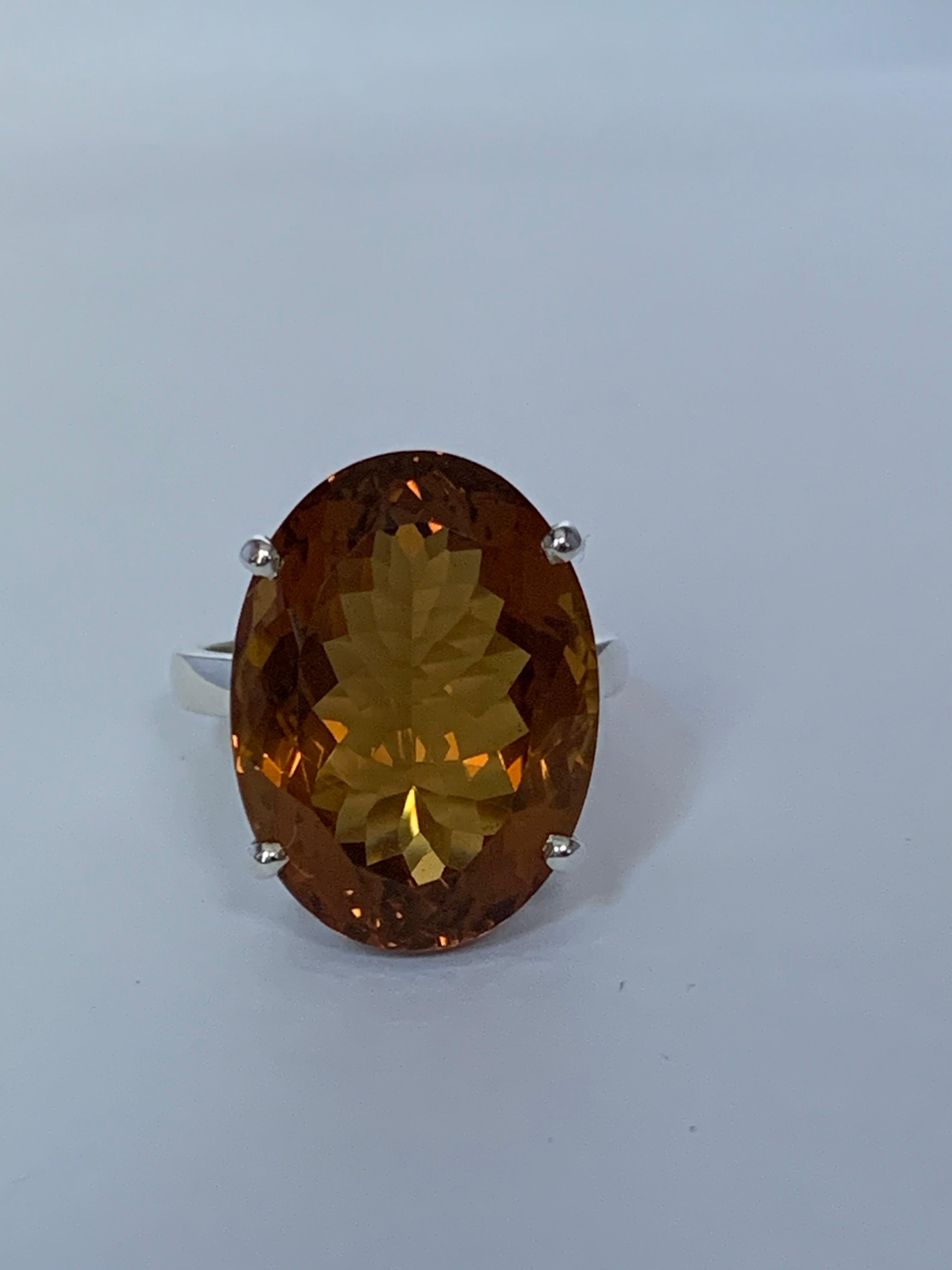 Natural Honey Quartz set in sterling silver ring  is oval 13mm X 20 mm . The color is very close to imperial Topaz. The stone is 100% Natural. The ring is one of a kind handcrafted by well skilled gold/ silver smith. Right now Size of the Ring is 8