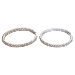 Pendientes de aro ovalados de oro blanco de 18 quilates engastados con 4 quilates de diamantes