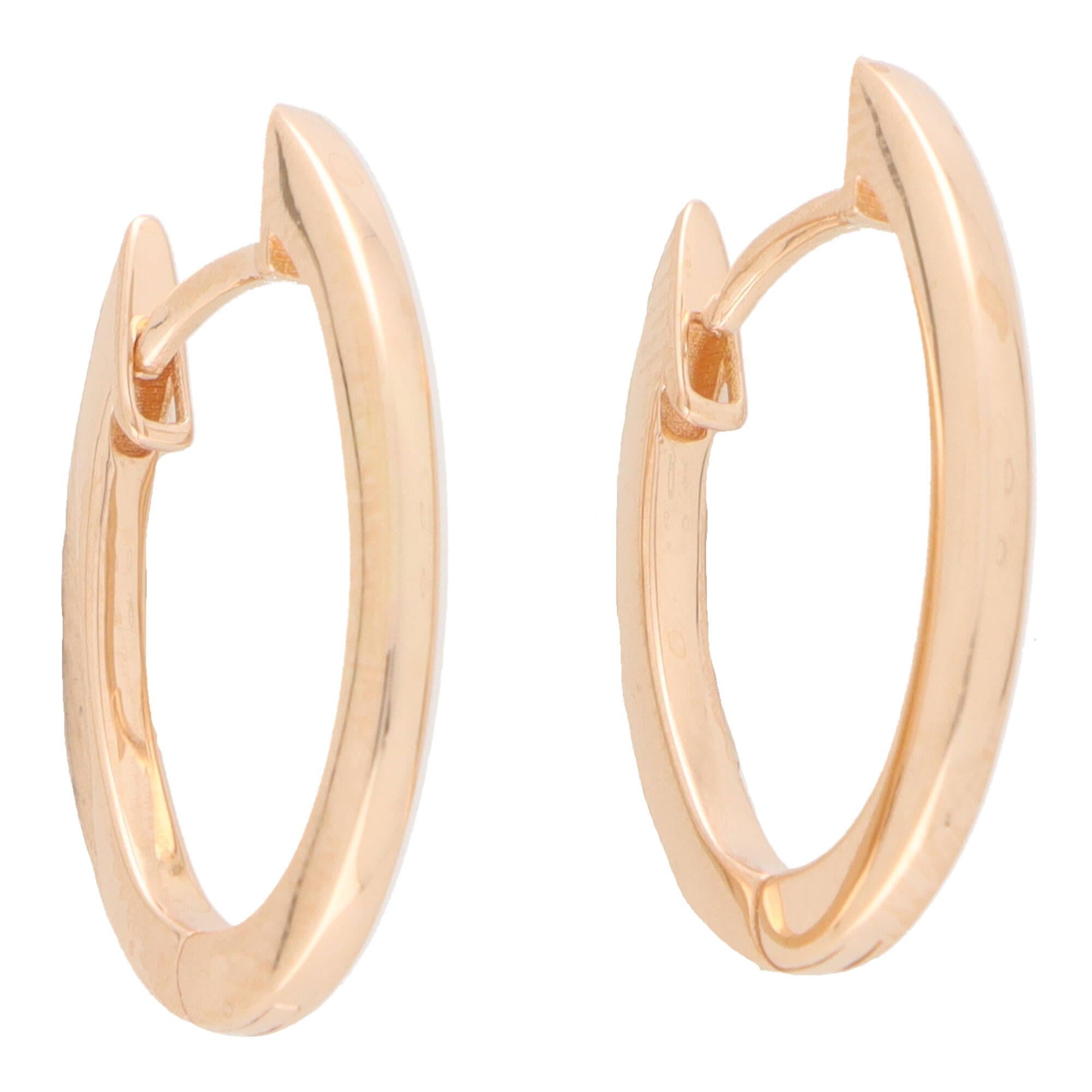 A perfect everyday pair of solid gold hoop earrings set in 18k rose gold.

These fabulous hoops are composed of an oval hoop design and are secured to reverse with a secure post and click fitting.

Due to the size and design these hoops would be a