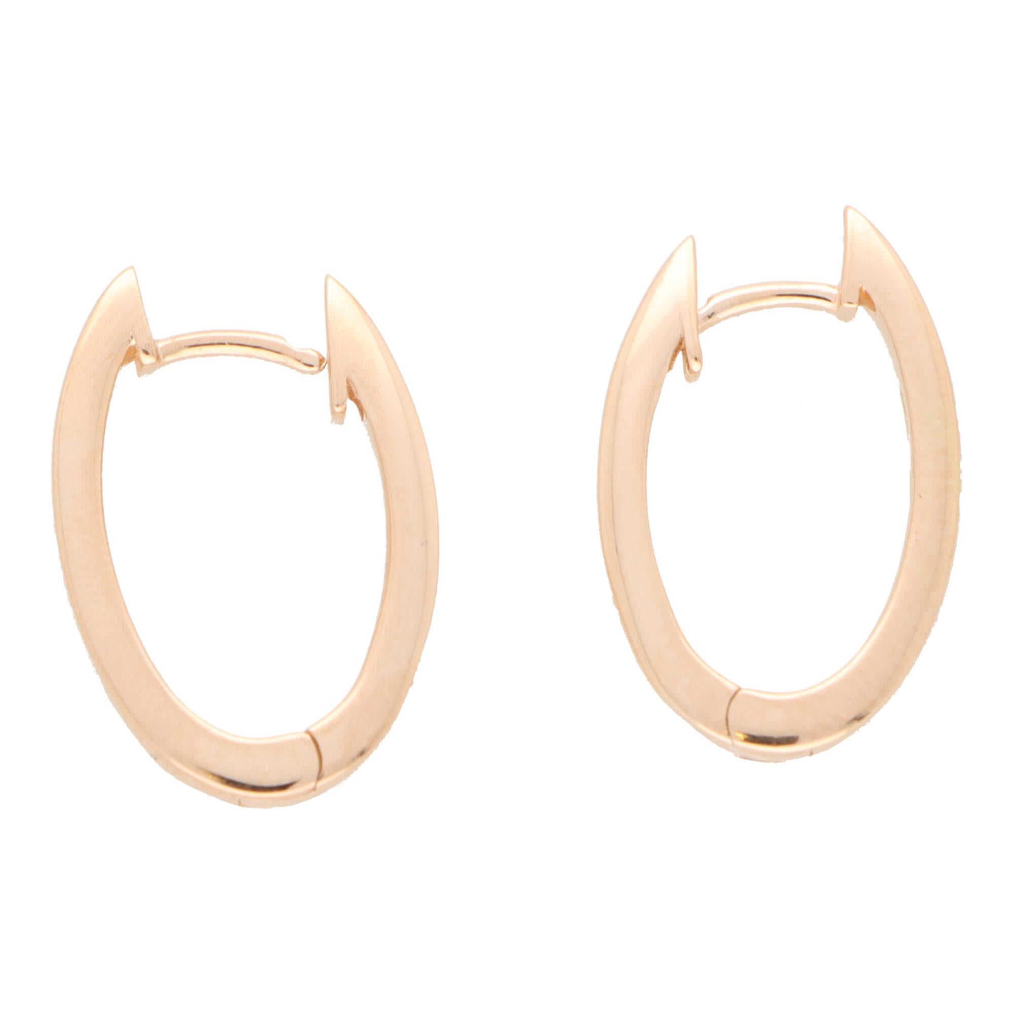 solid gold oval hoop earrings