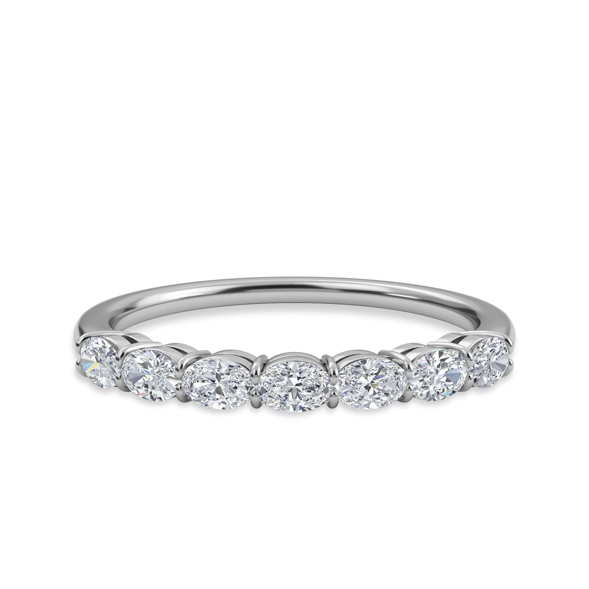 This Oval Horizontal Eternity Band features 7 Oval Diamonds, Set Horizontal, with a total weight of 0.60. They stones are F Color, VS-SI Clarity, and are set in a Shared Prong, Platinum setting. 

