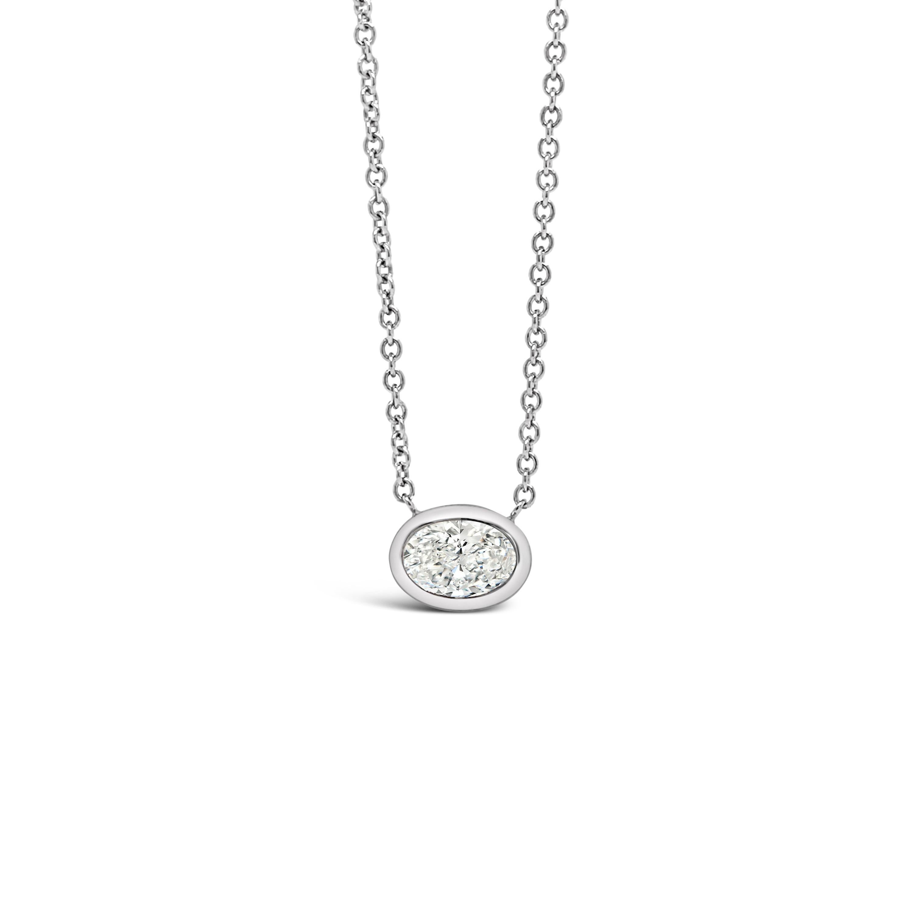 This pendant features and 40 Pointer Oval diamond set horizontally.
The diamond is E Color, SI2 Clarity. The Pendant is set in 18K White Gold.
The Oval diamond is GIA certified