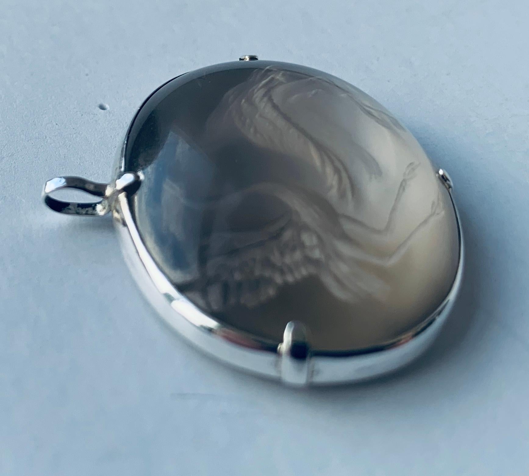 Oval Cut  Hand Carved Oval Intaglio Rock Crystal Pendant of Fighting CranesSilver Set 