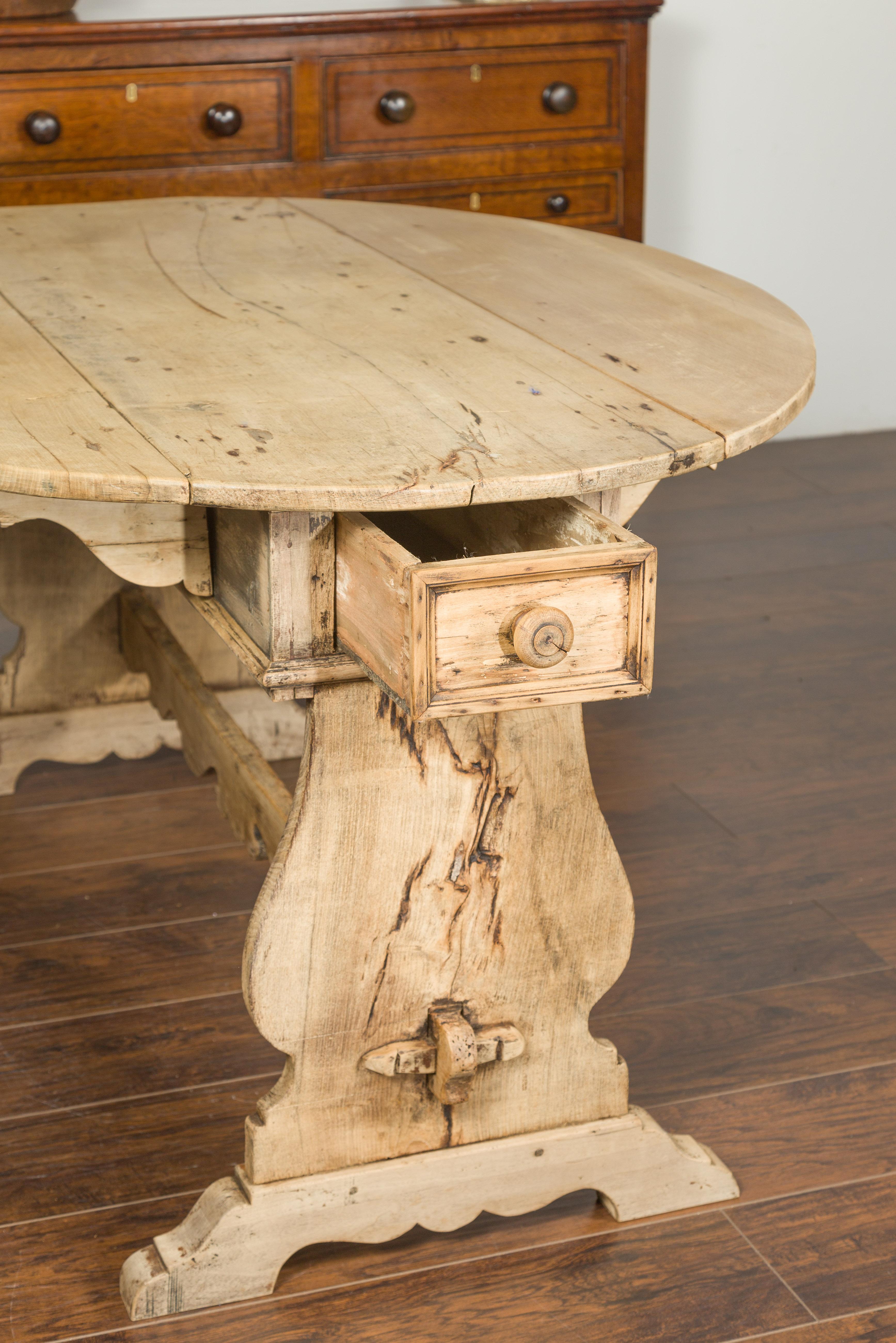 Oval Italian 1800s Bleached Walnut Drop-Leaf Trestle Table with Drawers For Sale 6
