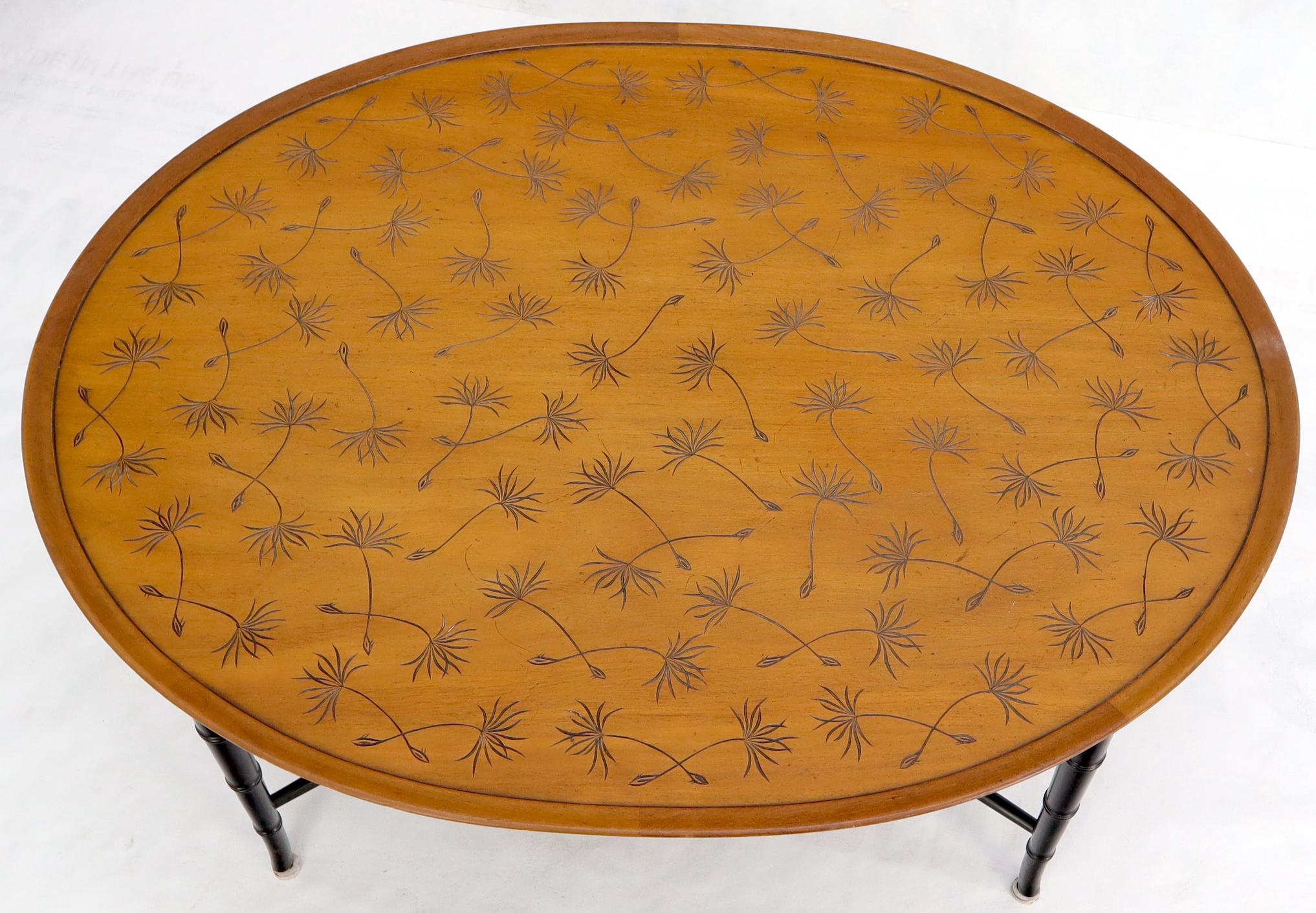Mid-Century Modern decorative tapered faux bamboo legs coffee table. Carved in leaf top design.