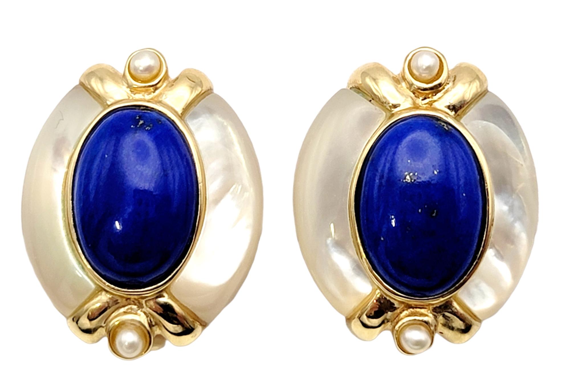 Bright and beautiful lapis and pearl pierced earrings fill the lobe with colorful elegance. The iridescent pearls absolutely radiate around the bright blue lapis, while the warm yellow gold offers a stunning contrast.  

Metal: 14K Yellow