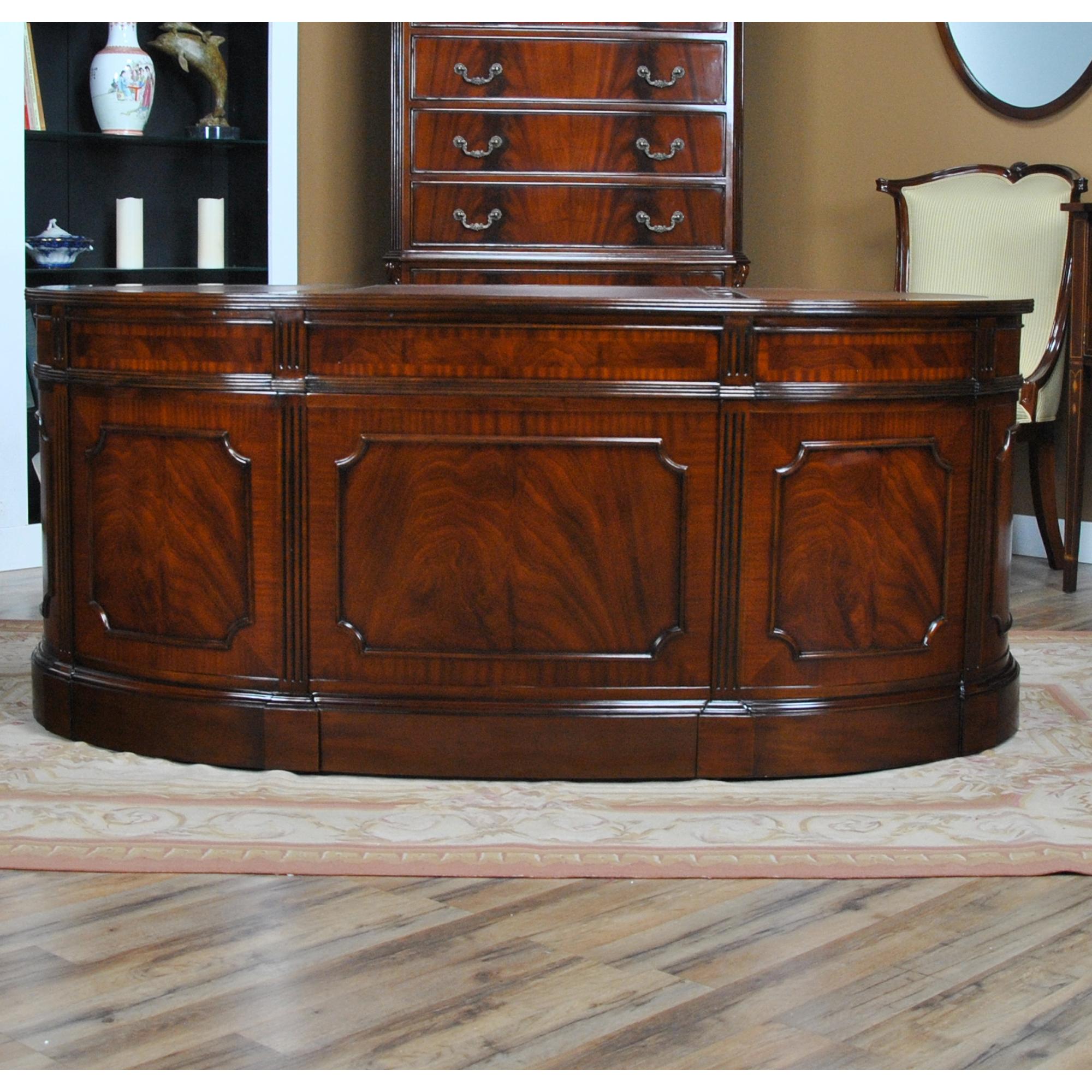 One of the most beautiful items that we produce at Niagara furniture our Oval Leather Top Desk with Privacy Panel will certainly also be one of the most popular. The top section of the desk consists of a three-paneled writing surfaces of brown full