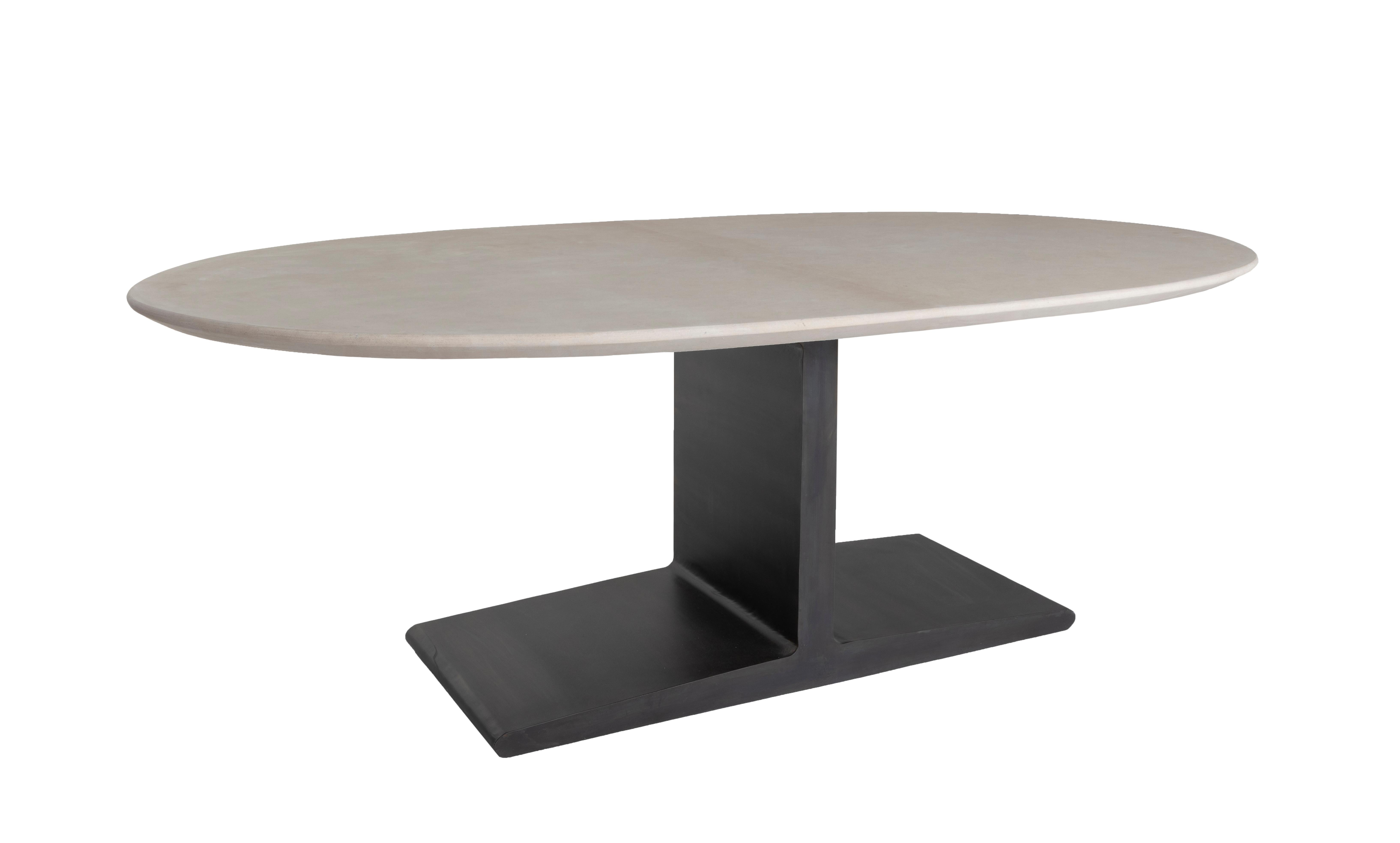 Oval limestone top dining table on steel I beam base.

Designed by Brendan Bass for the Vision and Design Collection, by using high quality materials and textures. All materials are sourced from local vendors throughout the state of Texas. The