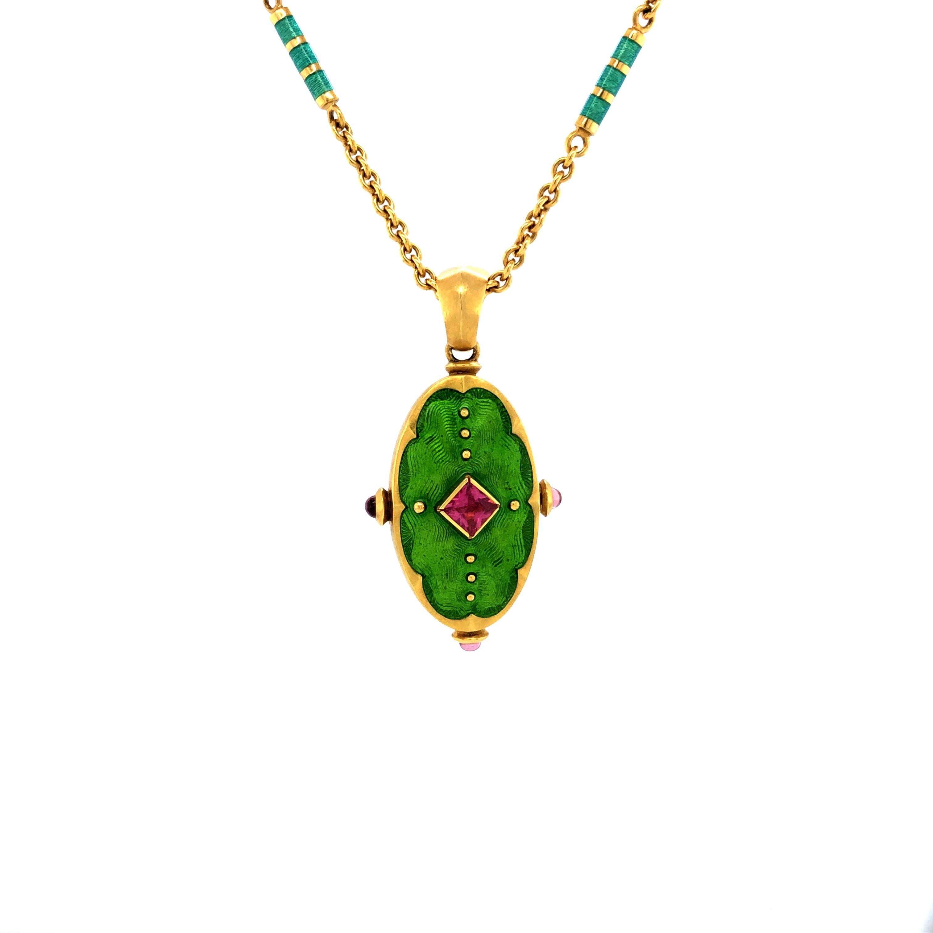 Victor Mayer oval locket pendant 18k yellow gold, matt vintage finish, Romance Collection, apple green vitreous enamel, guilloche, 1 rubellite (pink tourmaline), 3 cabochon rubellite, measurements app. 38.0 mm x 19.5 mm

About the creator Victor