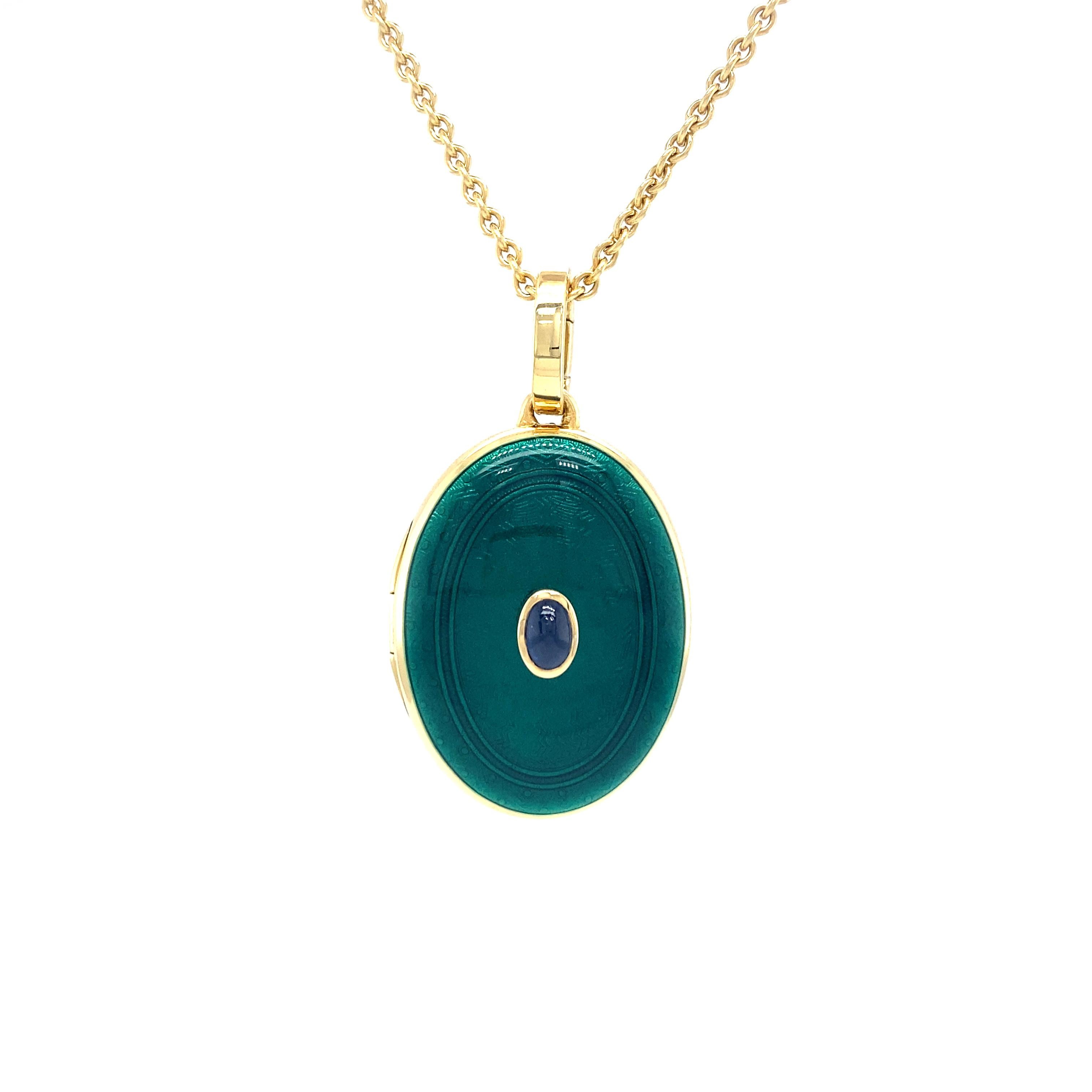 Victor Mayer oval locket pendant 18k yellow gold, translucent emerald green vitreous enamel, guilloche, 1 oval blue sapphire, cabochon, total 0.37 ct, measurements app. 27.5 mm x 21.0 mm

About the creator Victor Mayer
Victor Mayer is