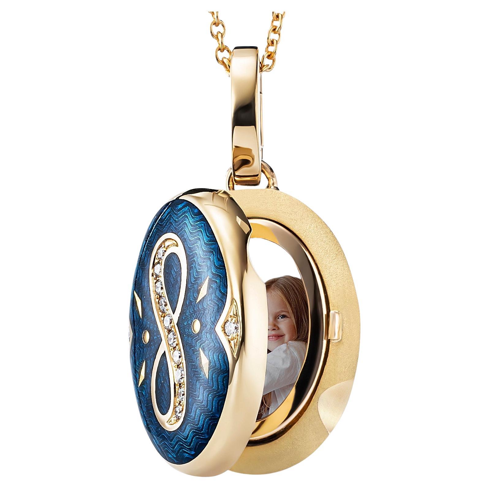 Victor Mayer oval locket pendant with infinity symbol 18k yellow gold, Victoria Collection, translucent peacock blue vitreous enamel, gold paillons, 12 diamonds, total 0.08 ct, G VS, brilliant cut, measurements app. 15.0 mm x 20.0 mm

About the