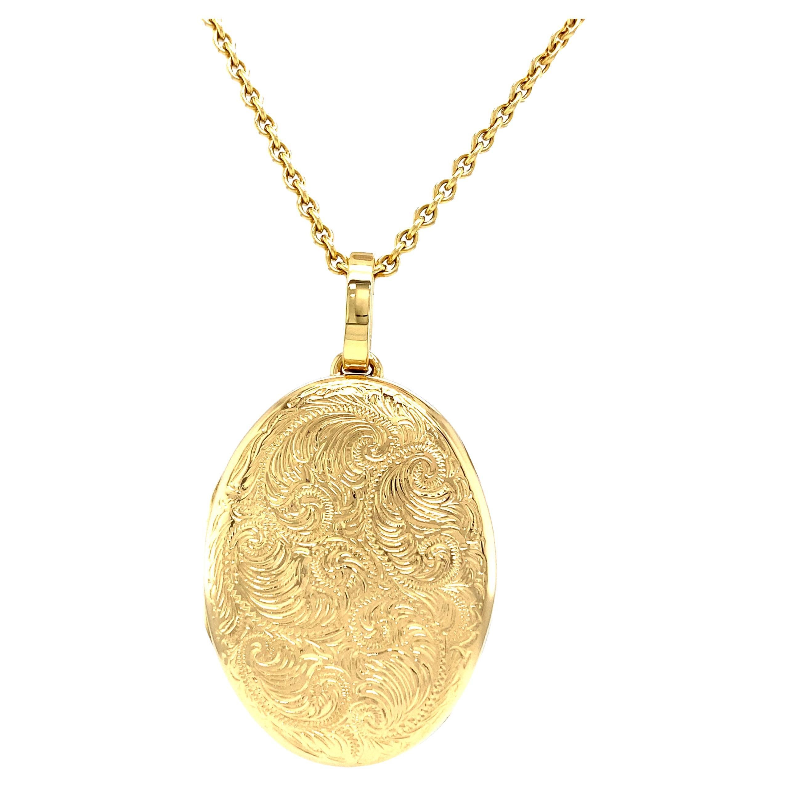 Victor Mayer oval locket pendant, 18k yellow gold, Hallmark Collection, scroll engraving by hand, measurements app. 32.0 mm x 23.0 mm

About the creator Victor Mayer
Victor Mayer is internationally renowned for elegant timeless designs and