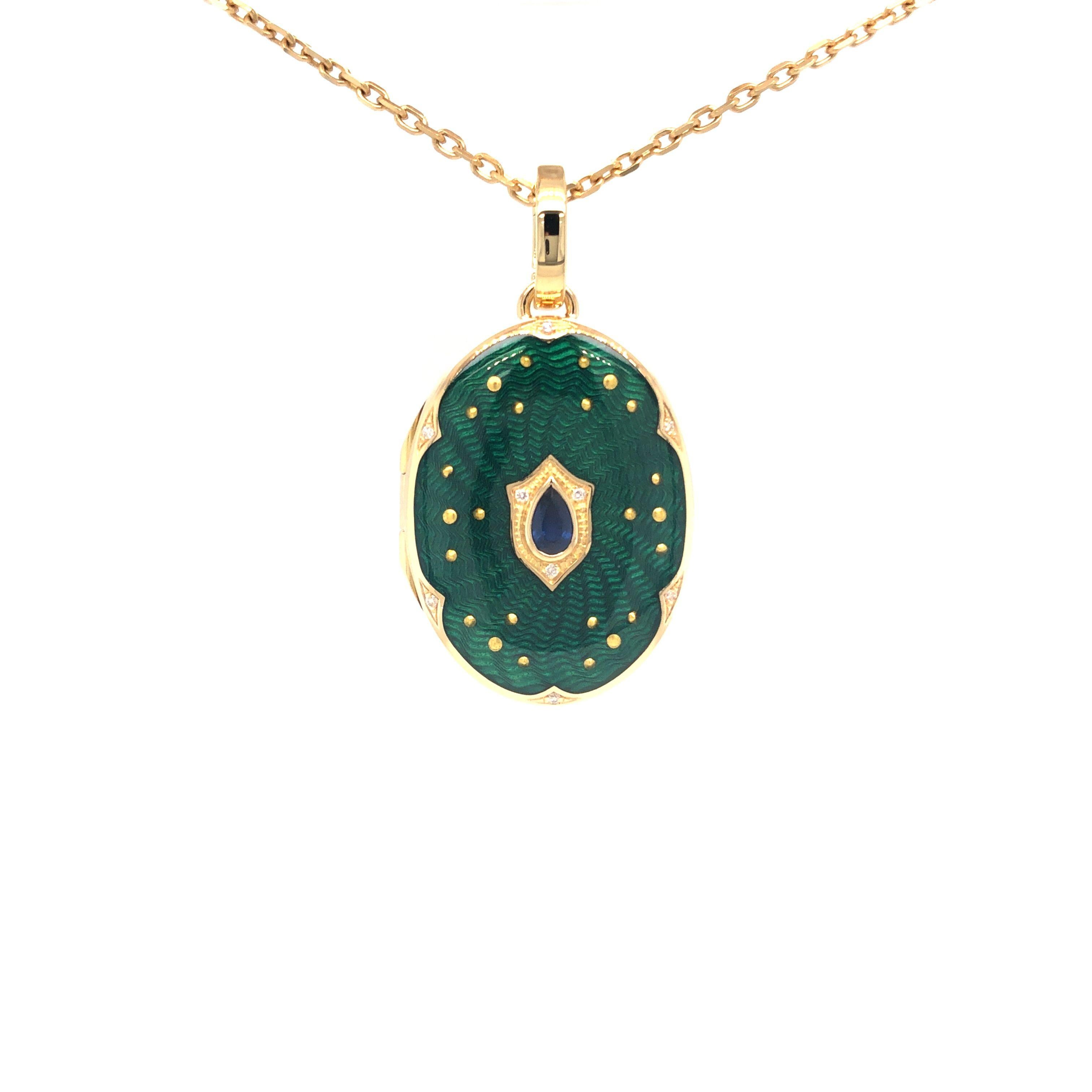Victor Mayer customizable oval locket pendant necklace, 18k Yellow gold, translucent royal blue vitreous enamel, gold paillons, 9 diamonds total 0.04 ct, G VS brilliant cut, 1 pear shaped blue sapphire, measurements app. 27.0 x 38.0 mm

About the