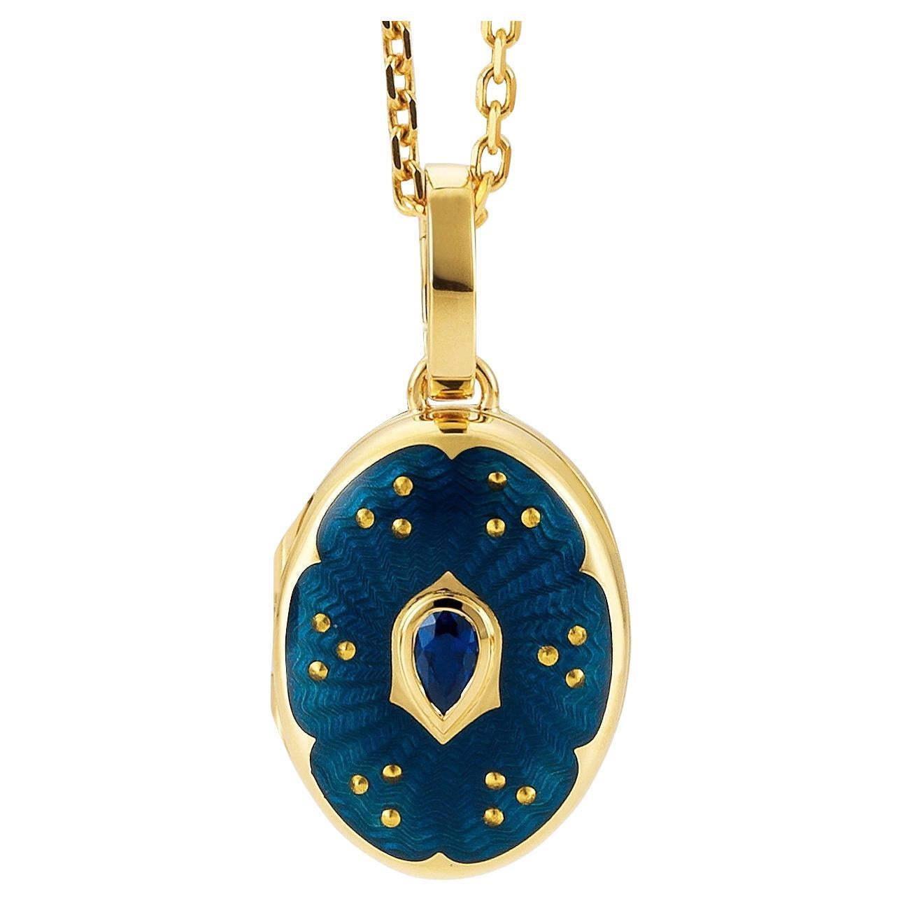  Collier pendentif médaillon ovale en or jaune 18 carats, émail bleu et 1 saphir en vente