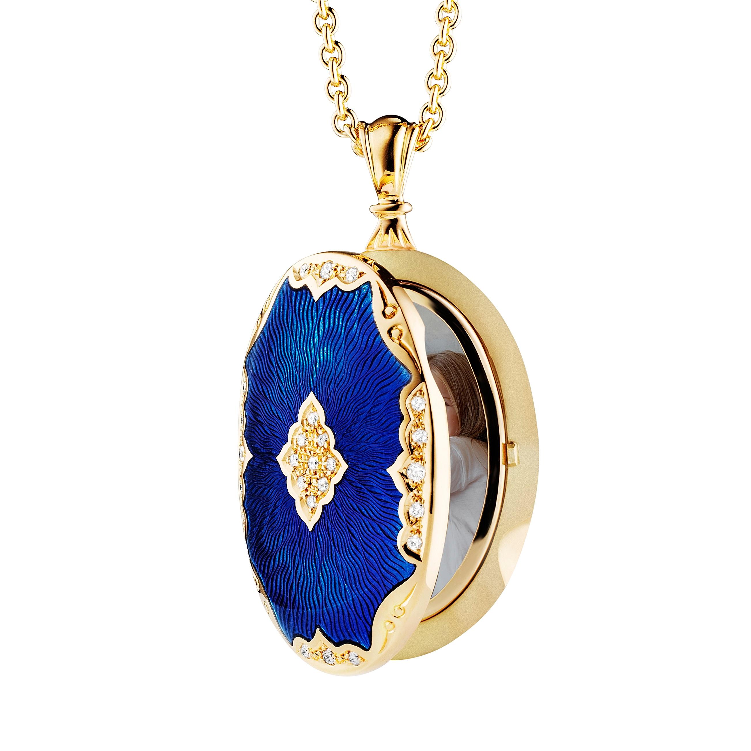Victor Mayer oval locket pendant neckalce 18k yellow gold, electric blue vitreous enamel, 25 diamonds, total 0.19 ct, measurements app. 25.0 mm x 36.0 mm, chain with four enamel links, 45 cm. 

About the creator Victor Mayer
Victor Mayer is