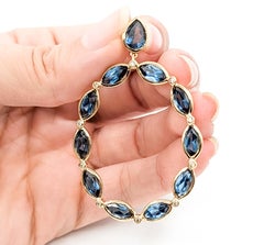 Oval London Blue Topaz & Diamond Pendant in 14k Yellow Gold
