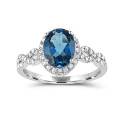 Oval London Blue Topaz with White Zircon Halo infinity ring in 10K White Gold