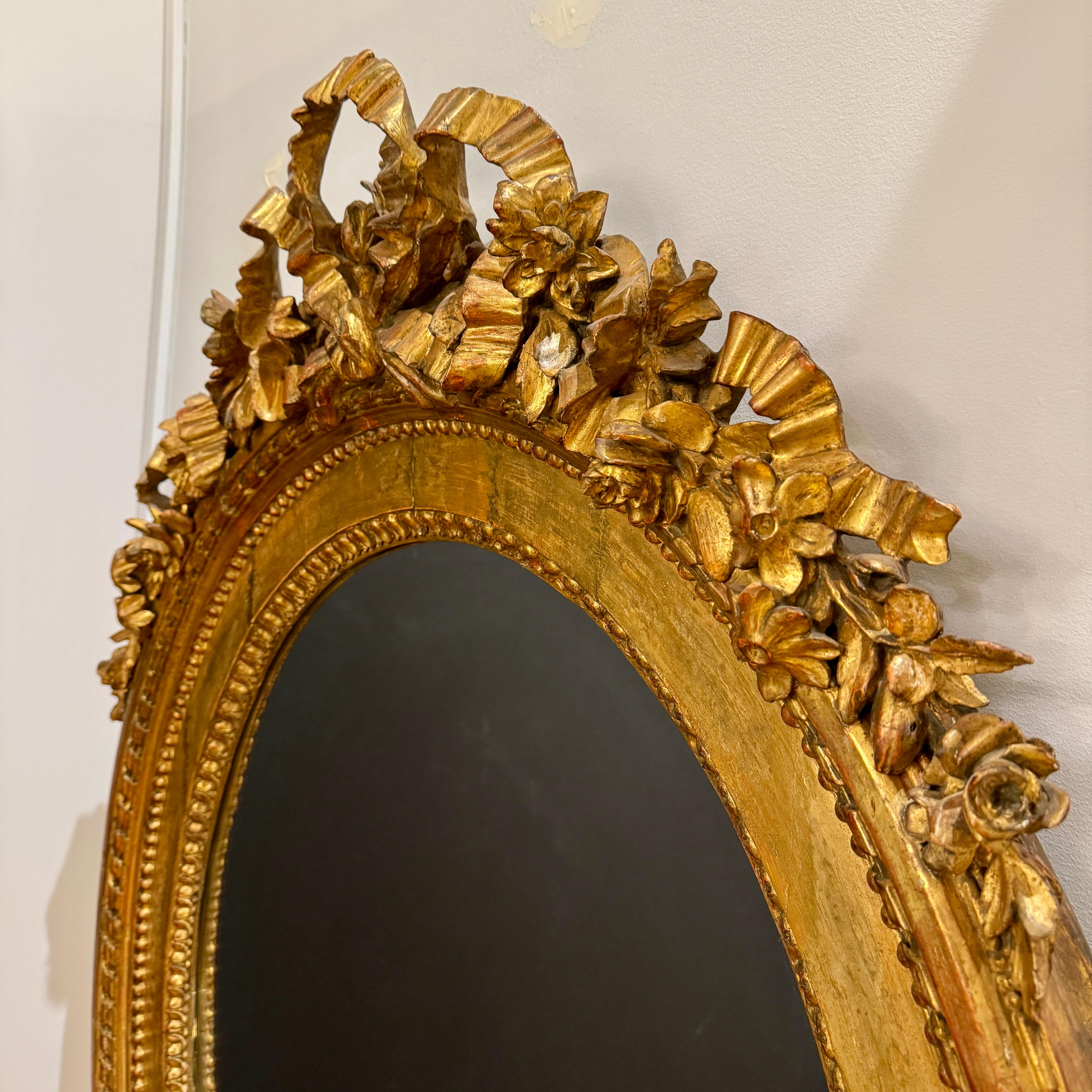 Miroir ovale Louis XVI en bois doré en vente 1