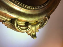 Oval Louis XVI mirror with gold leaf