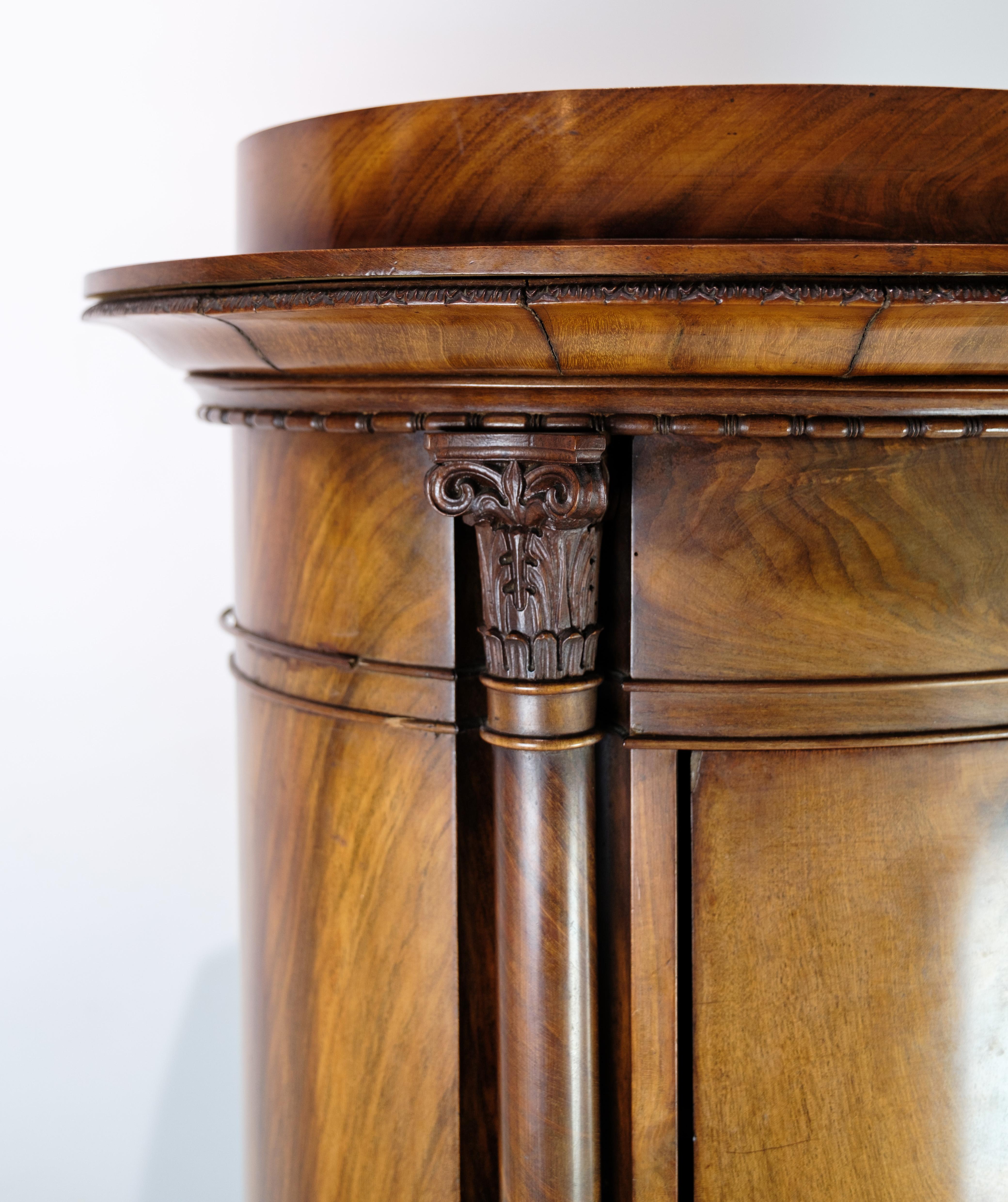 Oval Mahogany Pedestal Cabinet With Carvings From The 1820's  For Sale 1