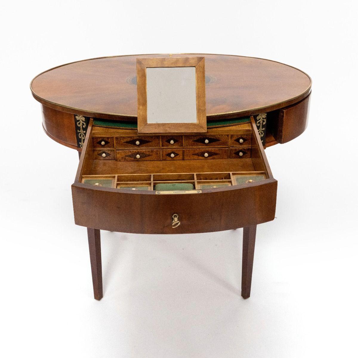 Empire Oval Mahogany Sewing Table with Gilded Bronze Inlays and Secret Compartments