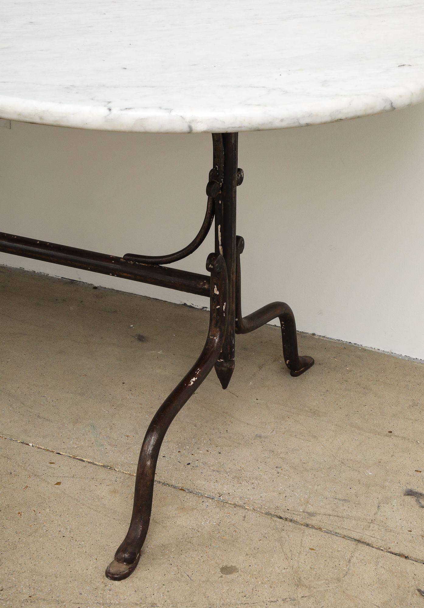 Oval Marble Topped Dining Table with Trestle Iron Base, France mid 20th c For Sale 8