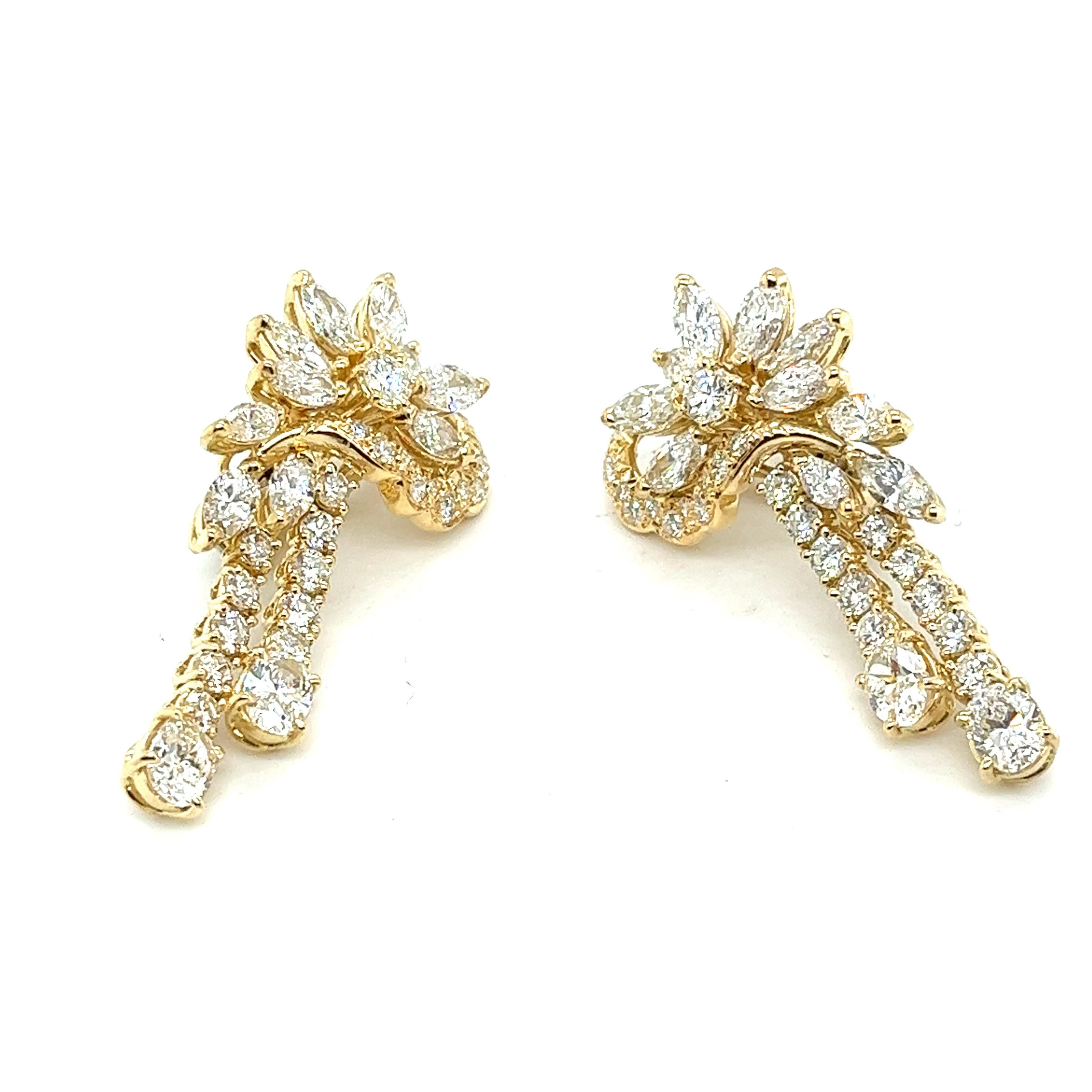 Timeless Vintage 18 Karat Gold Diamond Earrings

Description:
These vintage 18 karat yellow gold earrings are a true testament to timeless elegance. Crafted in the 1980s, they feature an exquisite array of natural earth mined diamonds, totaling