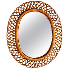 Oval Mid Century Mirror with Woven Rattan Frame
