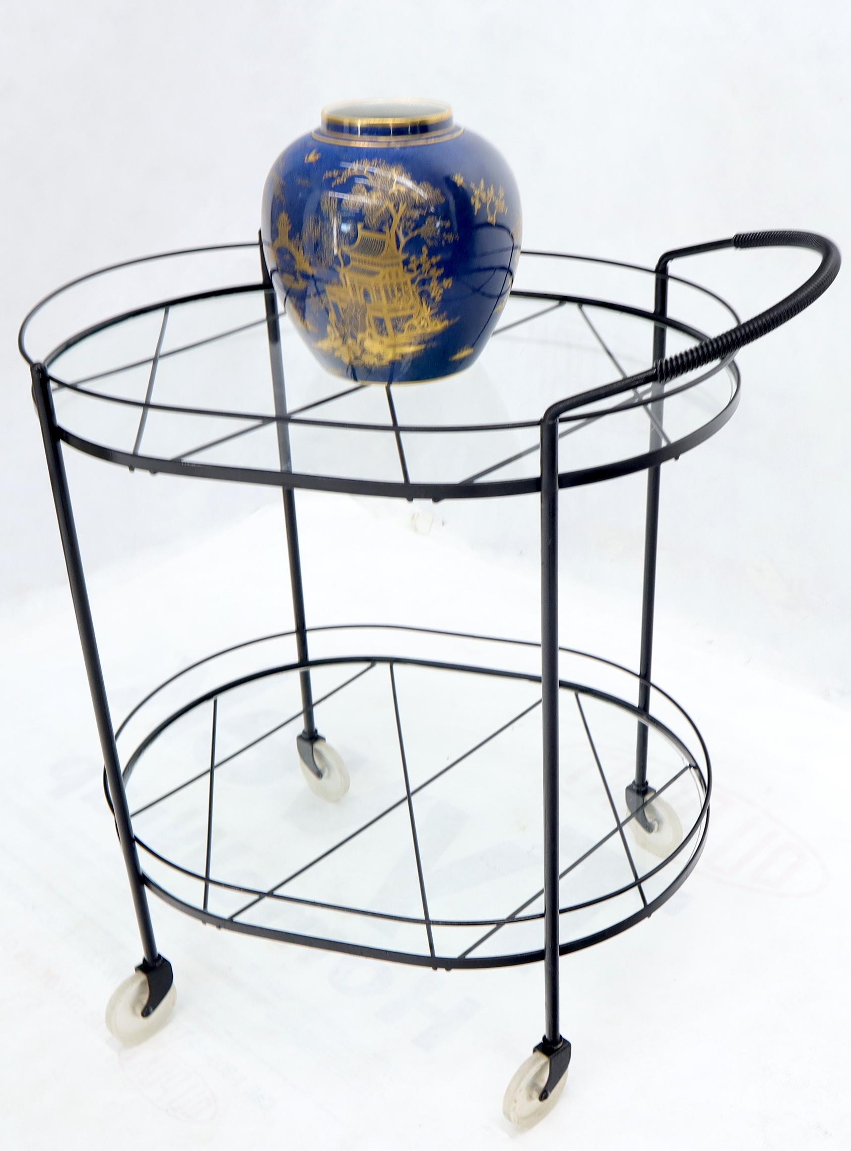 20ième siècle Oval Mid-Century Modern Black Lacquer Serving Bar Tea Cart en vente