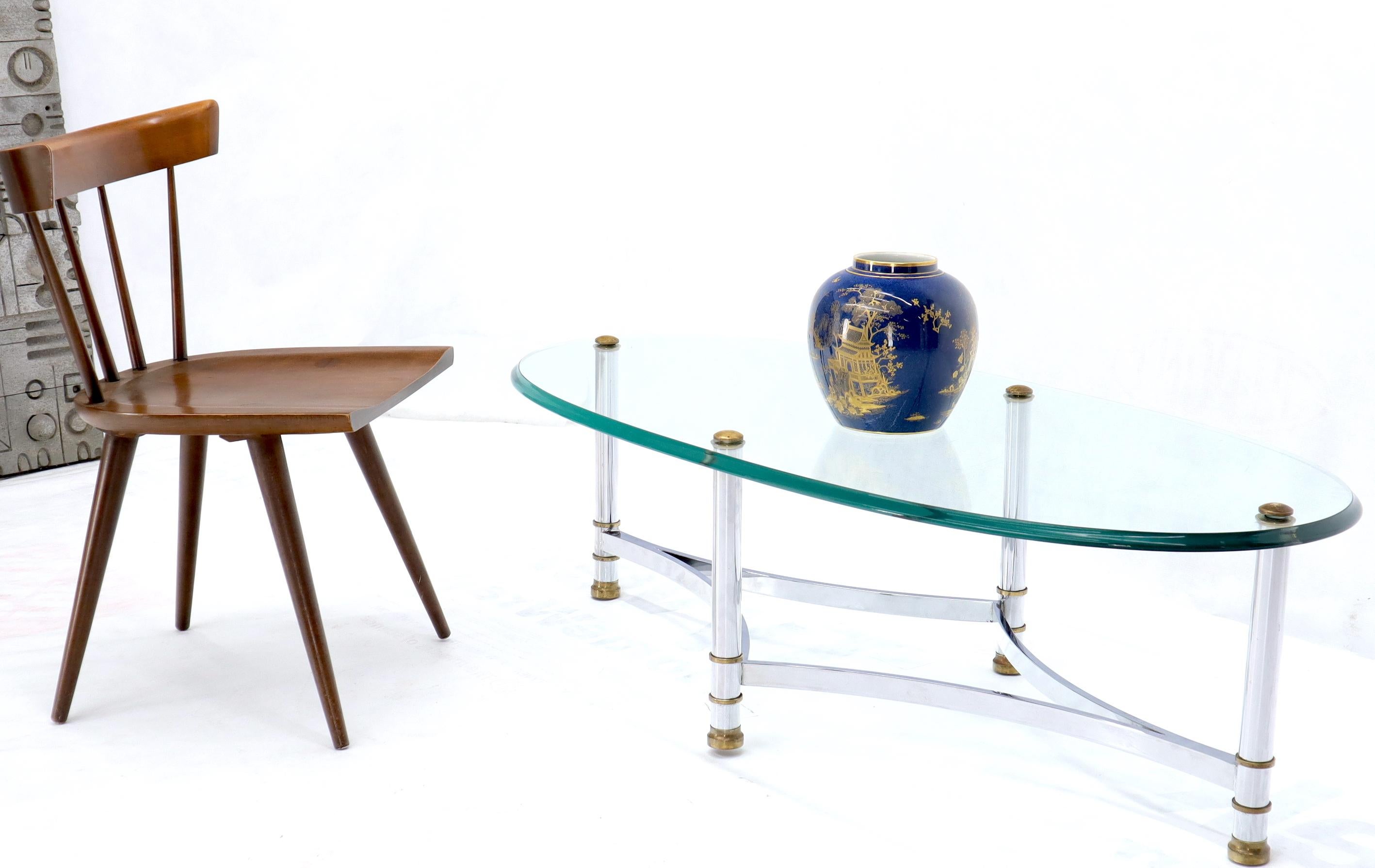Table basse en laiton chromé et verre, attribuée à la Maison Jansen.