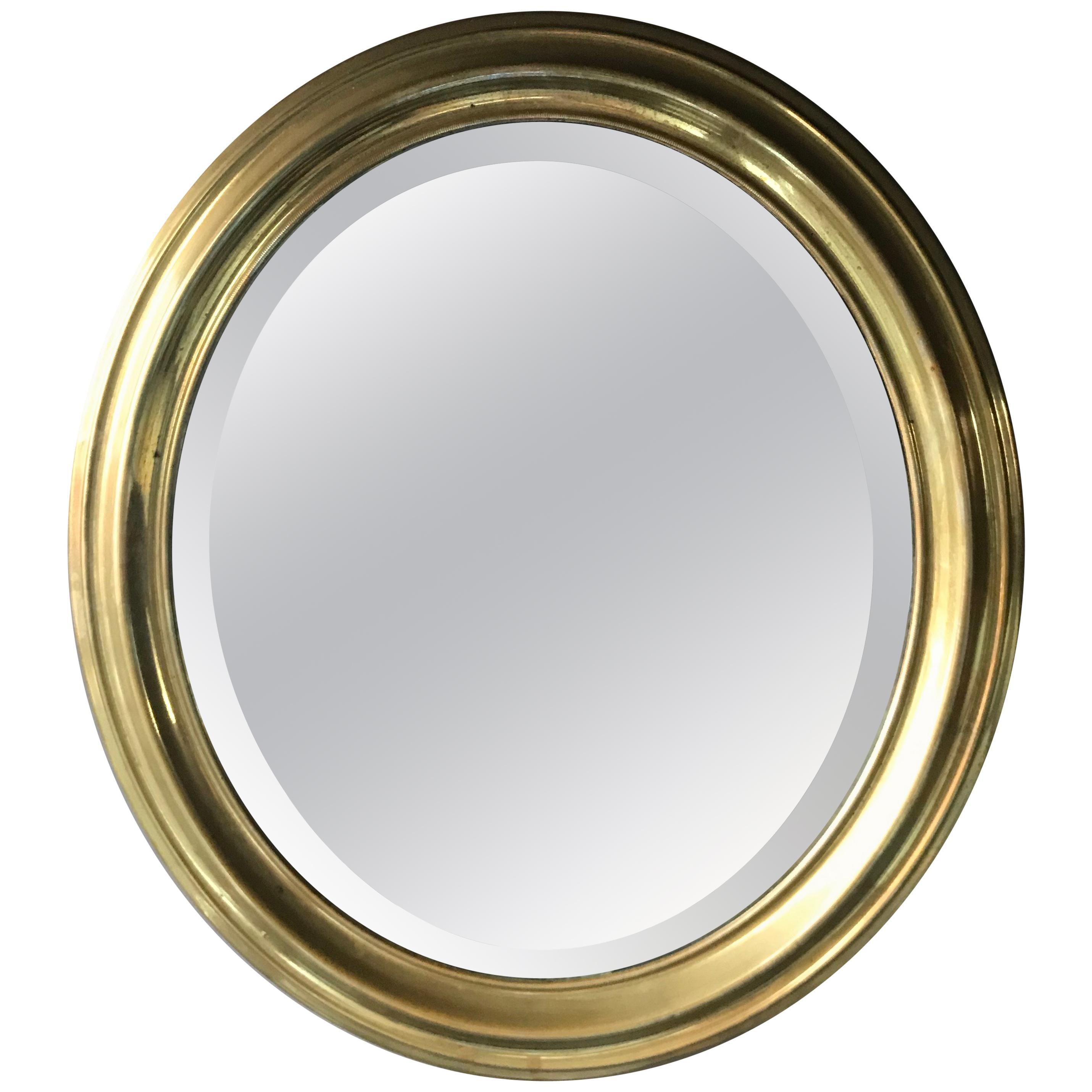 Oval Mirror in Brass For Sale