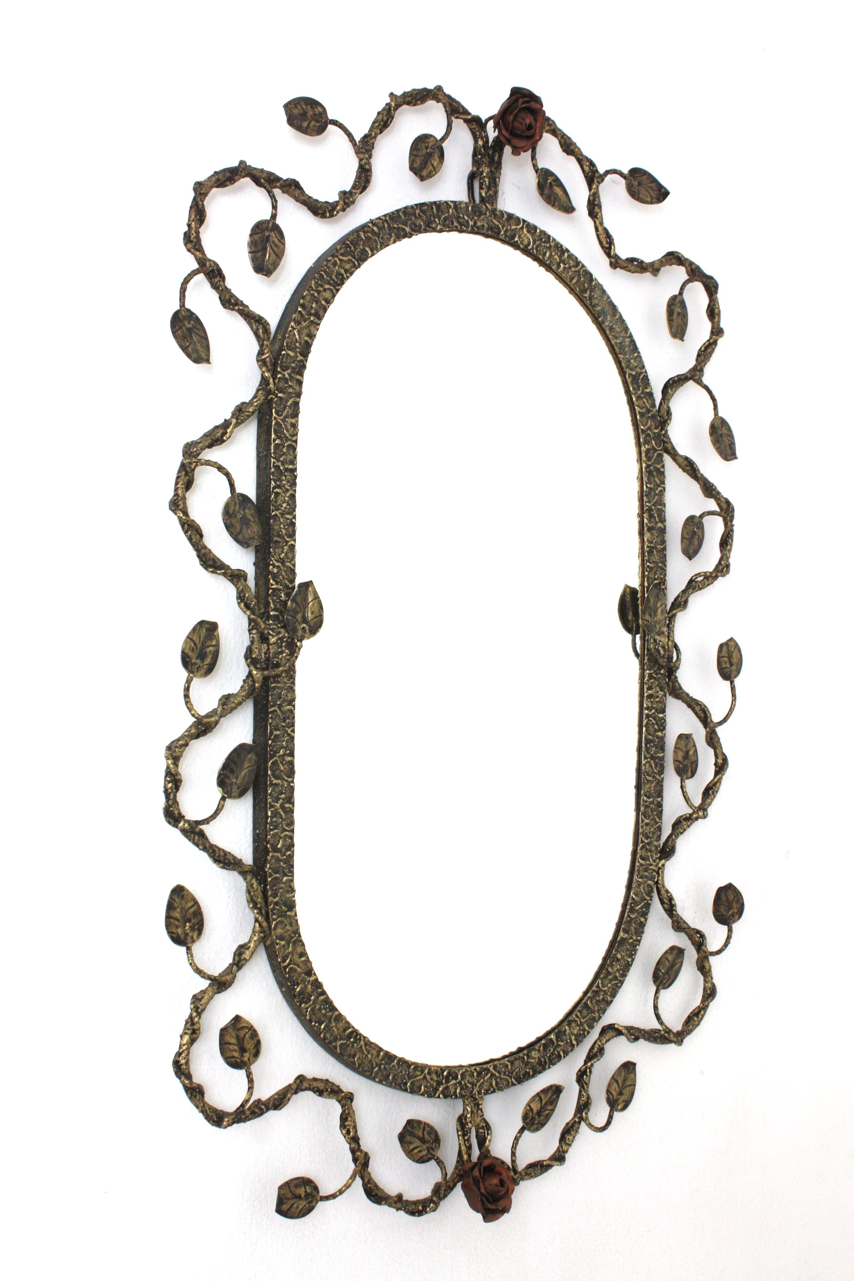Hollywood Regency Oval Mirror in Gilt Iron with Foliage Floral Motifs, 1950s For Sale
