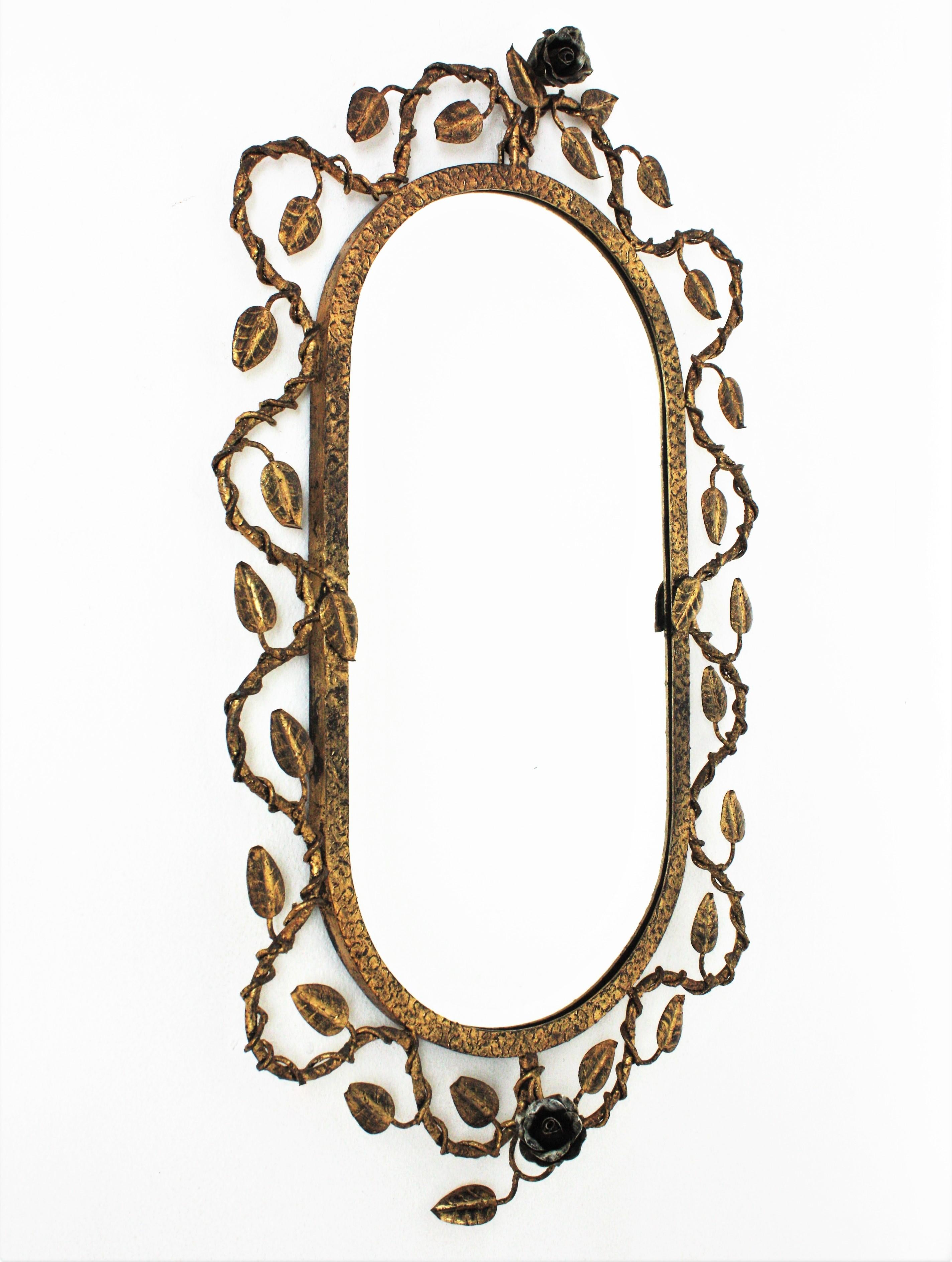 Hollywood Regency Oval Mirror in Gilt Iron with Foliage Floral Motifs