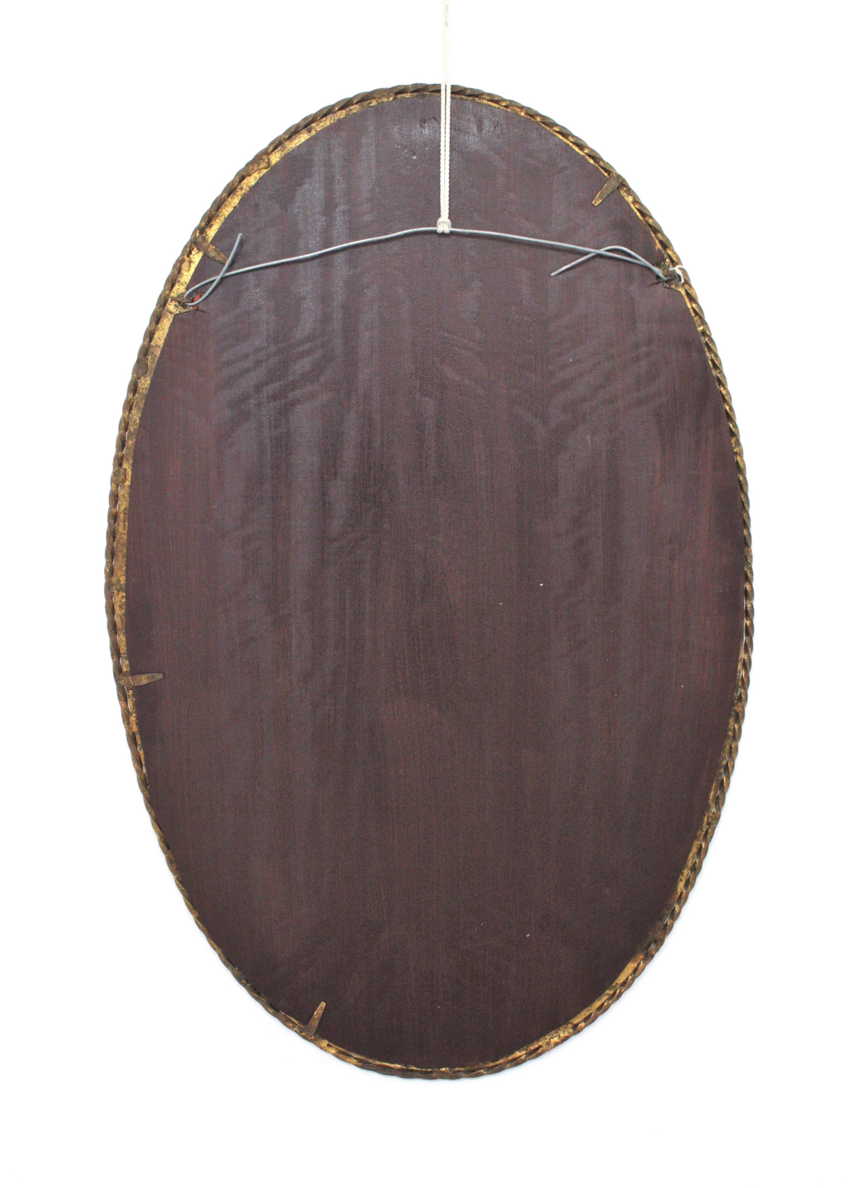 Miroir ovale en fer forgé doré, Espagne, années 1950 8