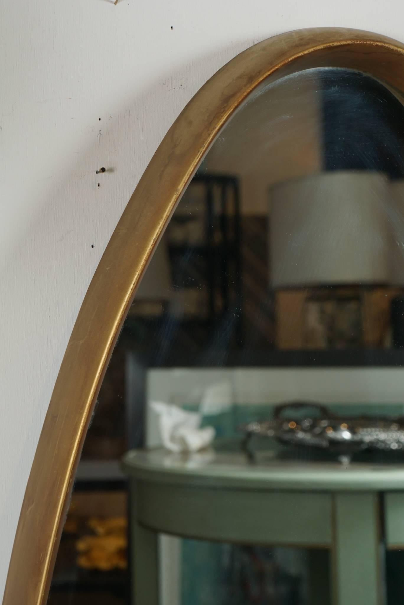 Mid-Century Modern Oval Mirror in Gold For Sale