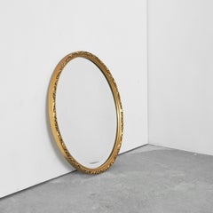 Specchio ovale in Wood dipinto in oro 1960
