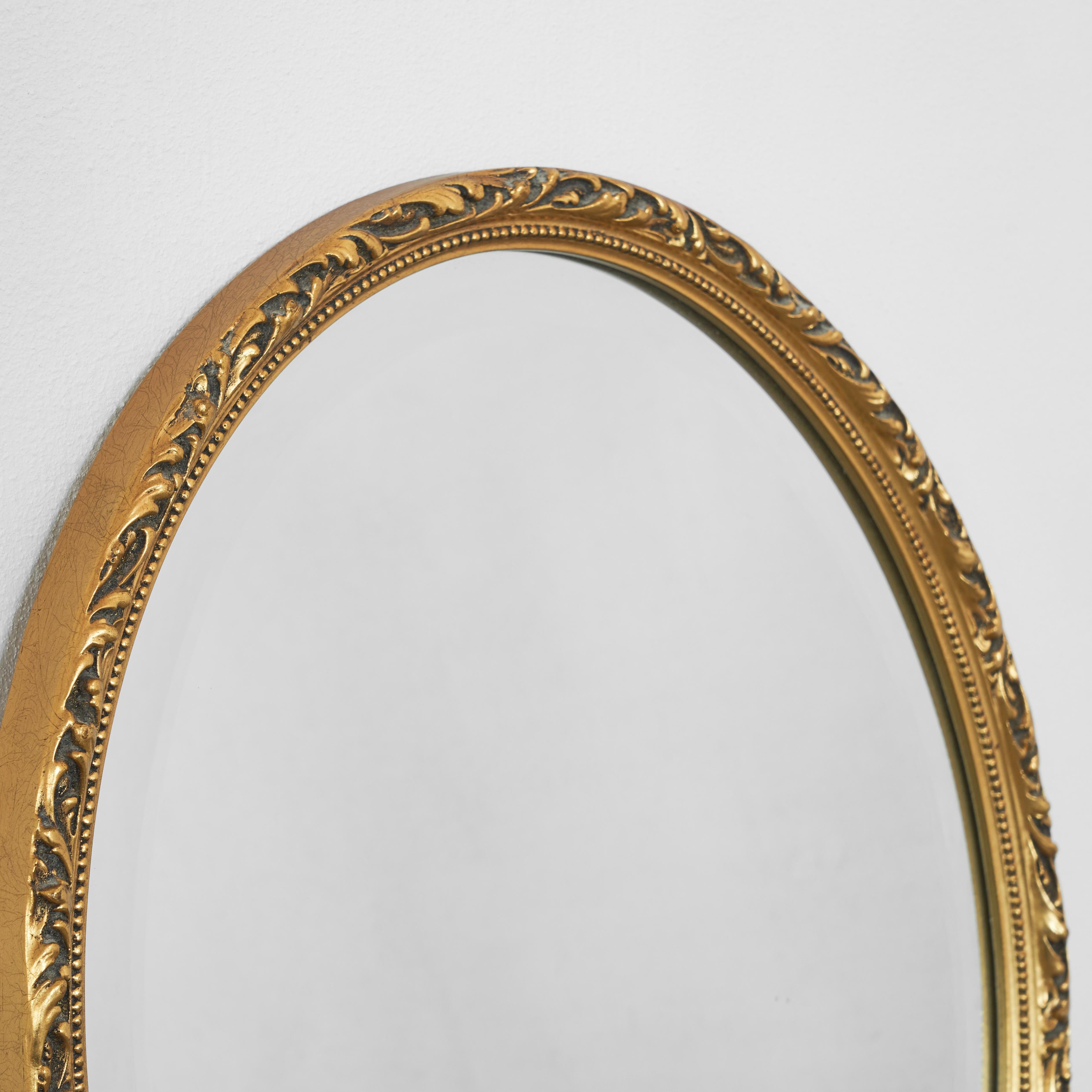 Neoclassical Oval Mirror in Gold Painted Wood 1960s For Sale