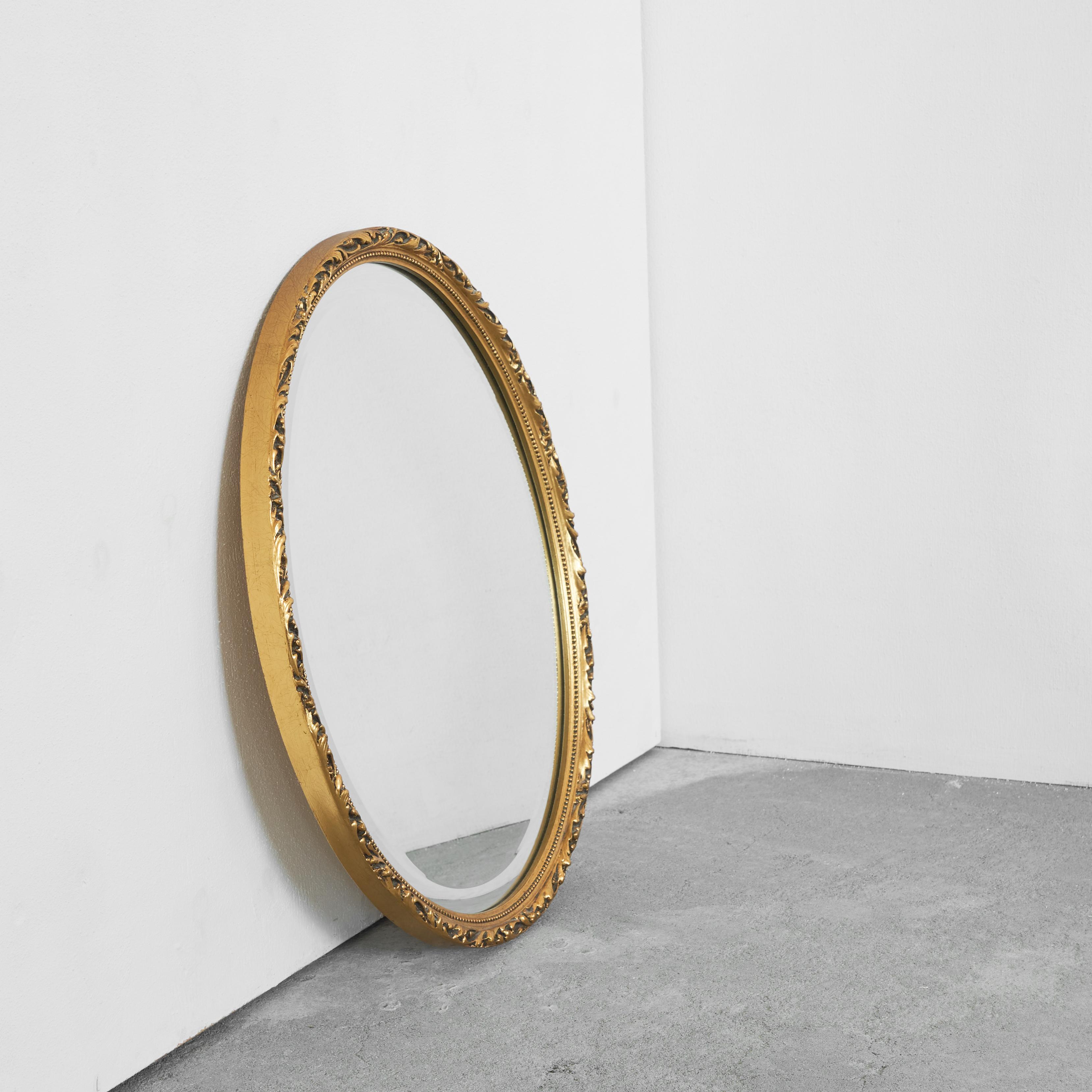 European Oval Mirror in Gold Painted Wood 1960s For Sale