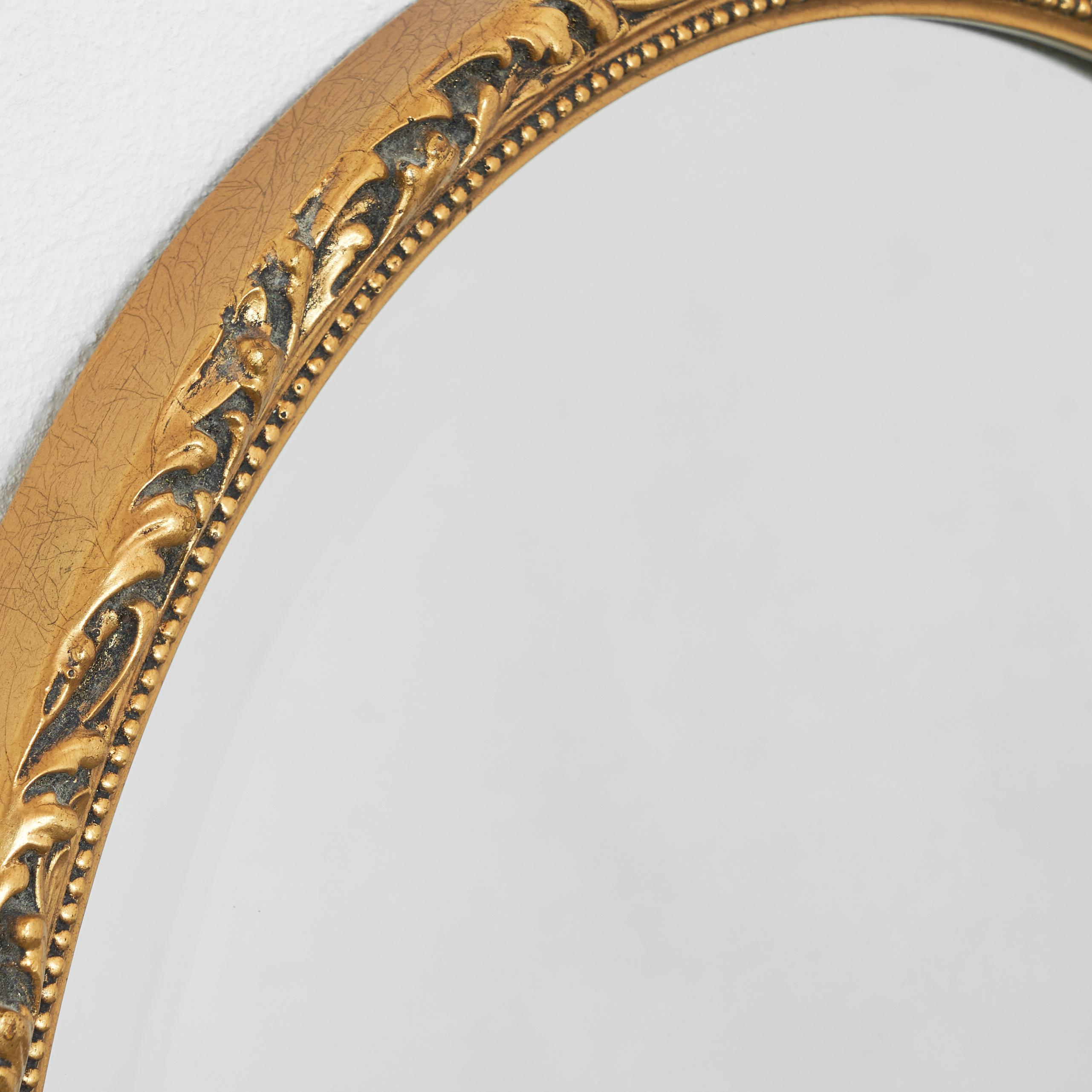 Hand-Crafted Oval Mirror in Gold Painted Wood 1960s For Sale