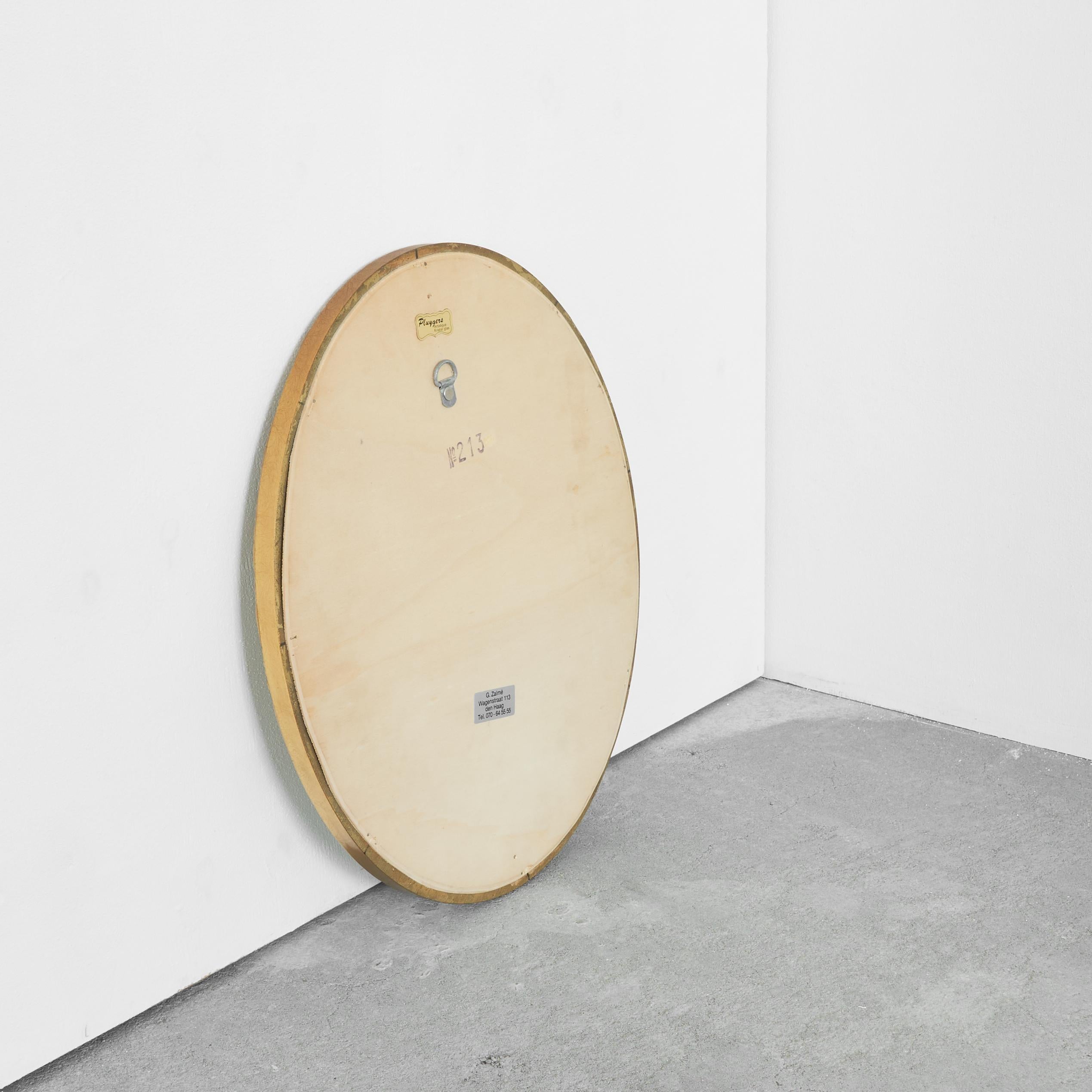 Bois Miroir ovale en bois peint à l'or, années 1960 en vente