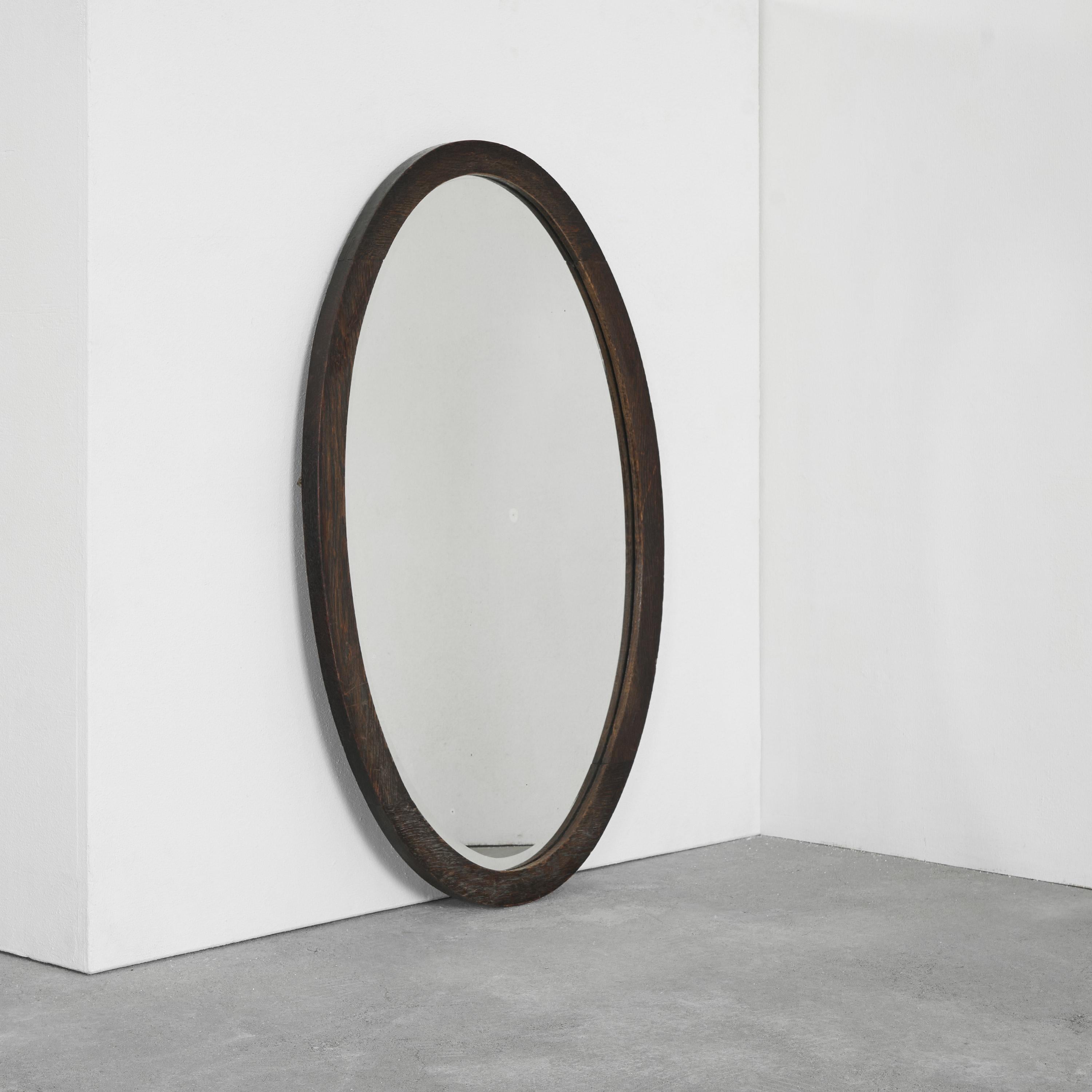 Oval Mirror in Solid Oak. Europe, 1930s.

Wonderful and honest 1930s mirror in solid oak with an elegant oval shape. Due to the size and proportions, this mirror is a great piece in any stylish interior were originality and honest materials are