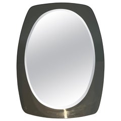 Espejo ovalado. Obra italiana de Fontana Arte. Alrededor de 1970