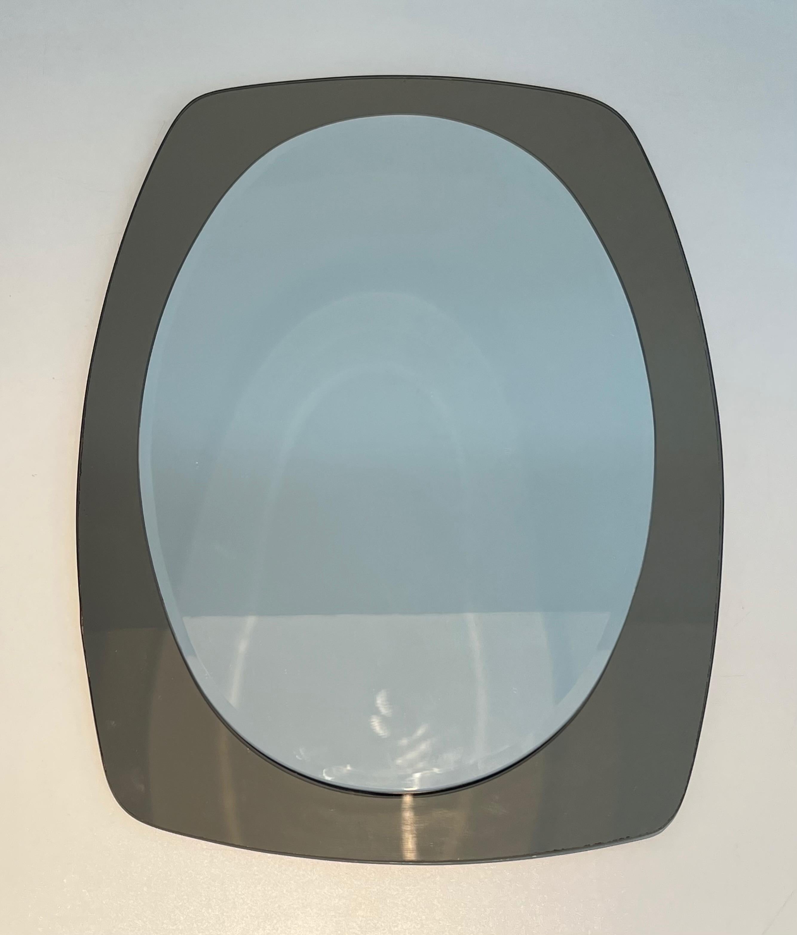 Oval mirror. Italian work by Fontana Arte. Circa 1970 For Sale 4